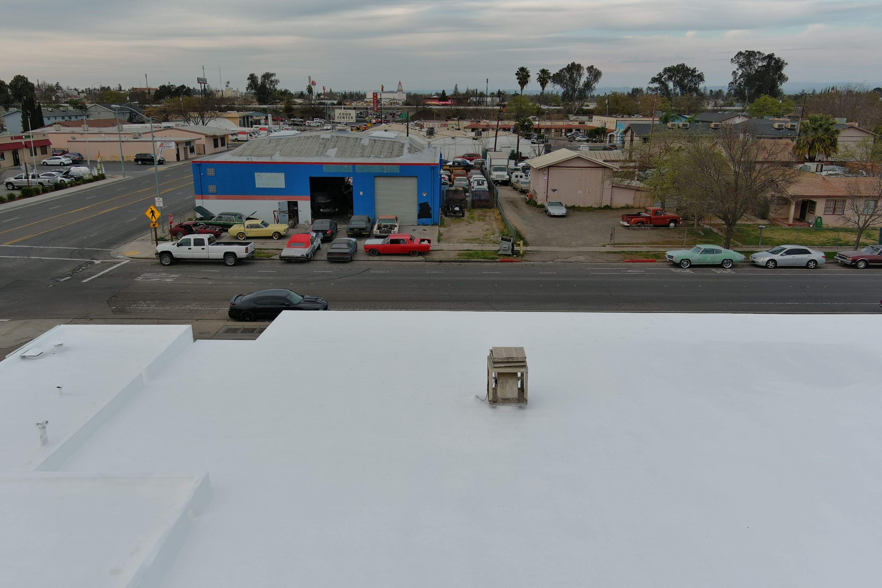 Spray foam and coatings using Conklin Benchmark/PUMA XL coatings and spray foam by Straight Edge Roofing Inc