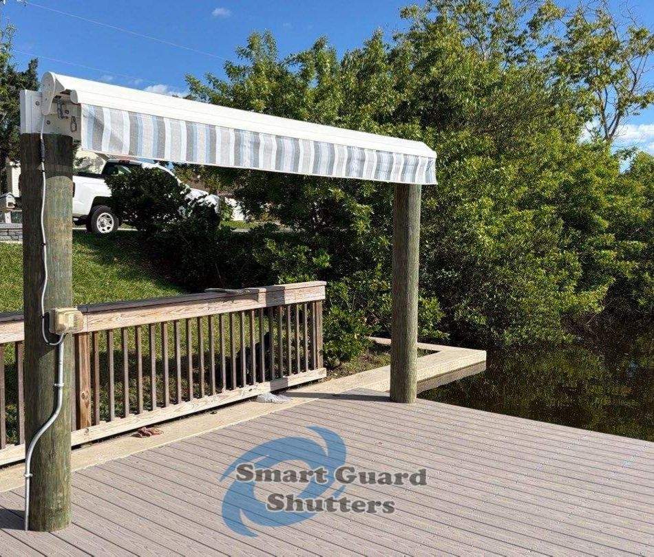 Retractable Awning in Sunbrella Marco Blue Grey by Smart Guard Shutters