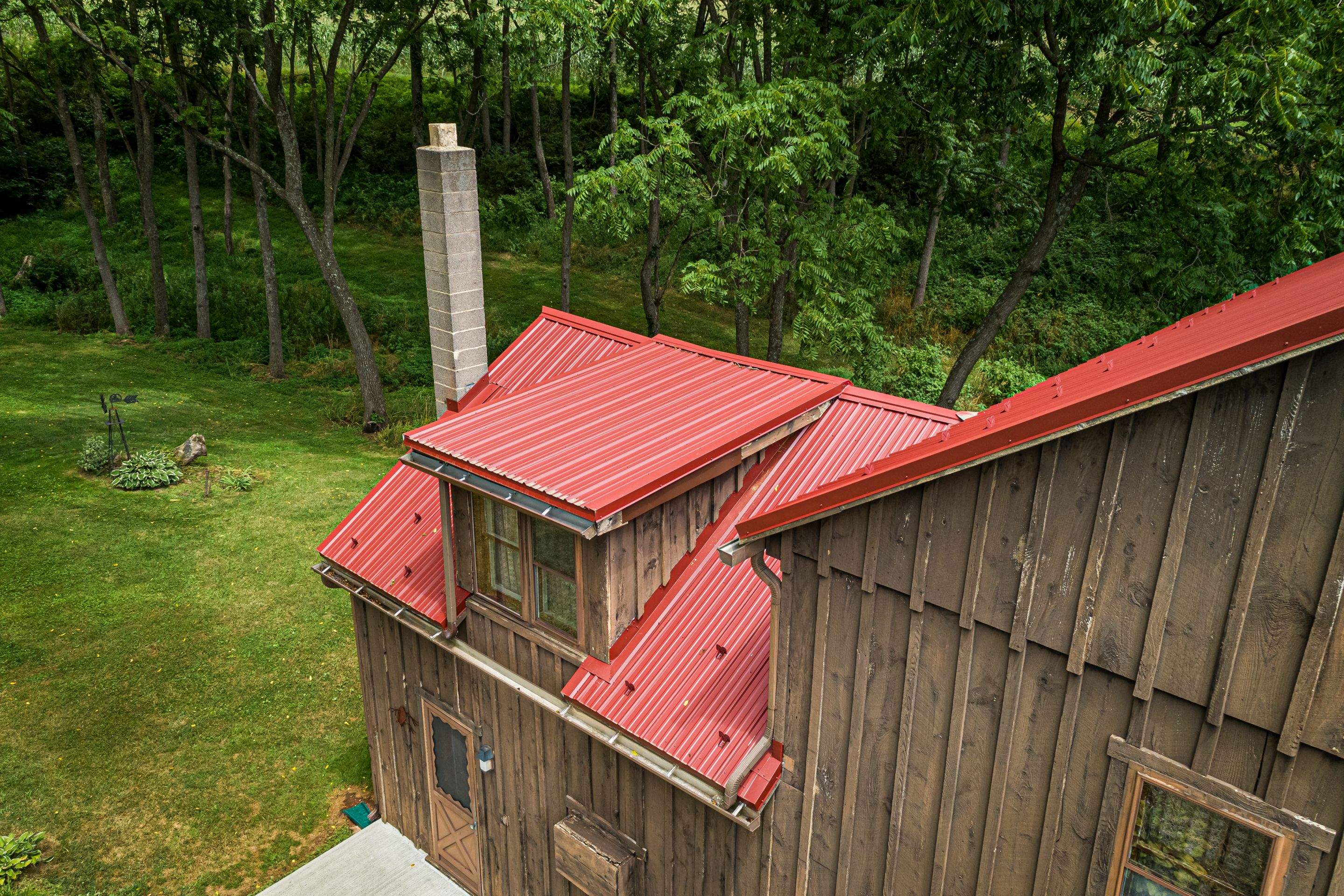 Metal Roof-colonial red by Esh Builders