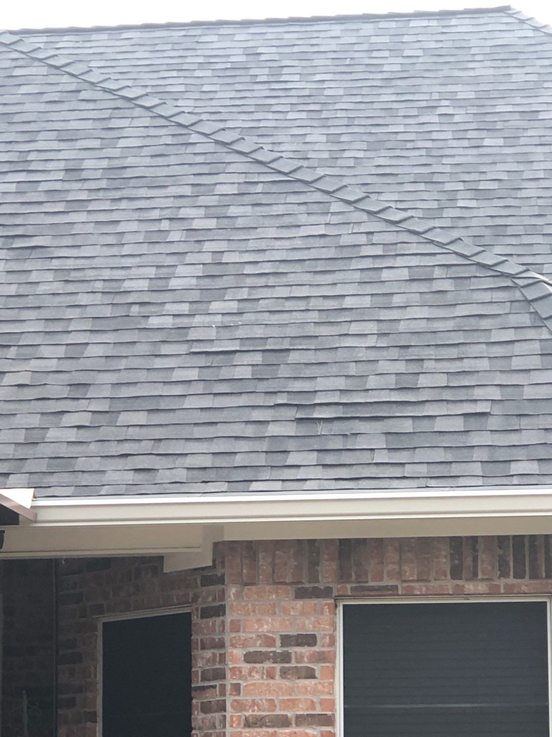 Certainteed Landmark Moire Black Roof project by Springtree Restoration 