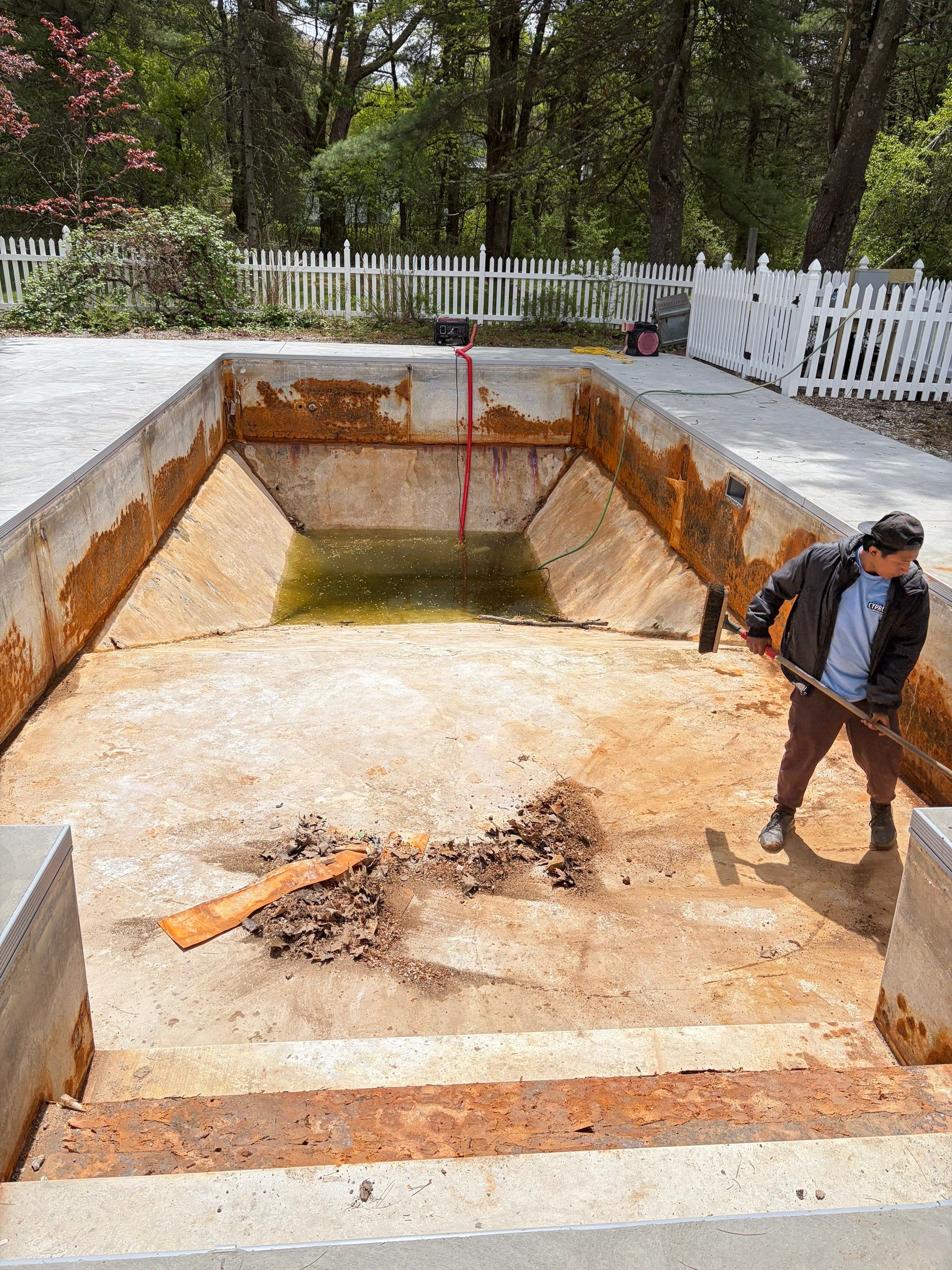 In-Ground Swimming Pool Renovation and Concrete Decking in Old Chatham by Cypress Pools and Spas