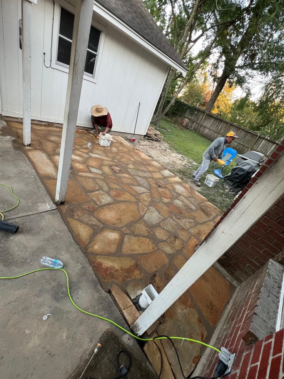 🌿 Rodney – Full Gutters, Drainage System, Flagstone Patio & Pergola  Alejandro and the Texas Urban Elements Team recently completed a multi-solution project for Rodney’s home, blending function with design.  ✅ Seamless Gutters We installed a complete 6” seamless gutter system around the home to properly redirect rainwater away from the foundation, protecting siding, paint, and landscaping while boosting curb appeal.  ✅ Drainage System A new PVC storm drainage system was integrated into the gutters and extended to carry roof runoff away from the house. This ensures water won’t pool near the foundation or the new patio area.  ✅ Flagstone Patio Ground We prepped, leveled, and installed a custom flagstone patio for Rodney—delivering both beauty and durability, creating a natural, timeless look that ties perfectly into the yard.  ✅ Pergola Addition To conclude, our framing team constructed a small pergola extension, providing Rodney’s patio with a shaded retreat for family and friends to enjoy.  ✨ Result: A fully protected and enhanced outdoor living space where drainage, stonework, and structure all work together for long-lasting performance and comfort.  📢 At Texas Urban Elements, we specialize in building solutions that protect homes while creating beautiful outdoor environments. by Texas Urban Elements