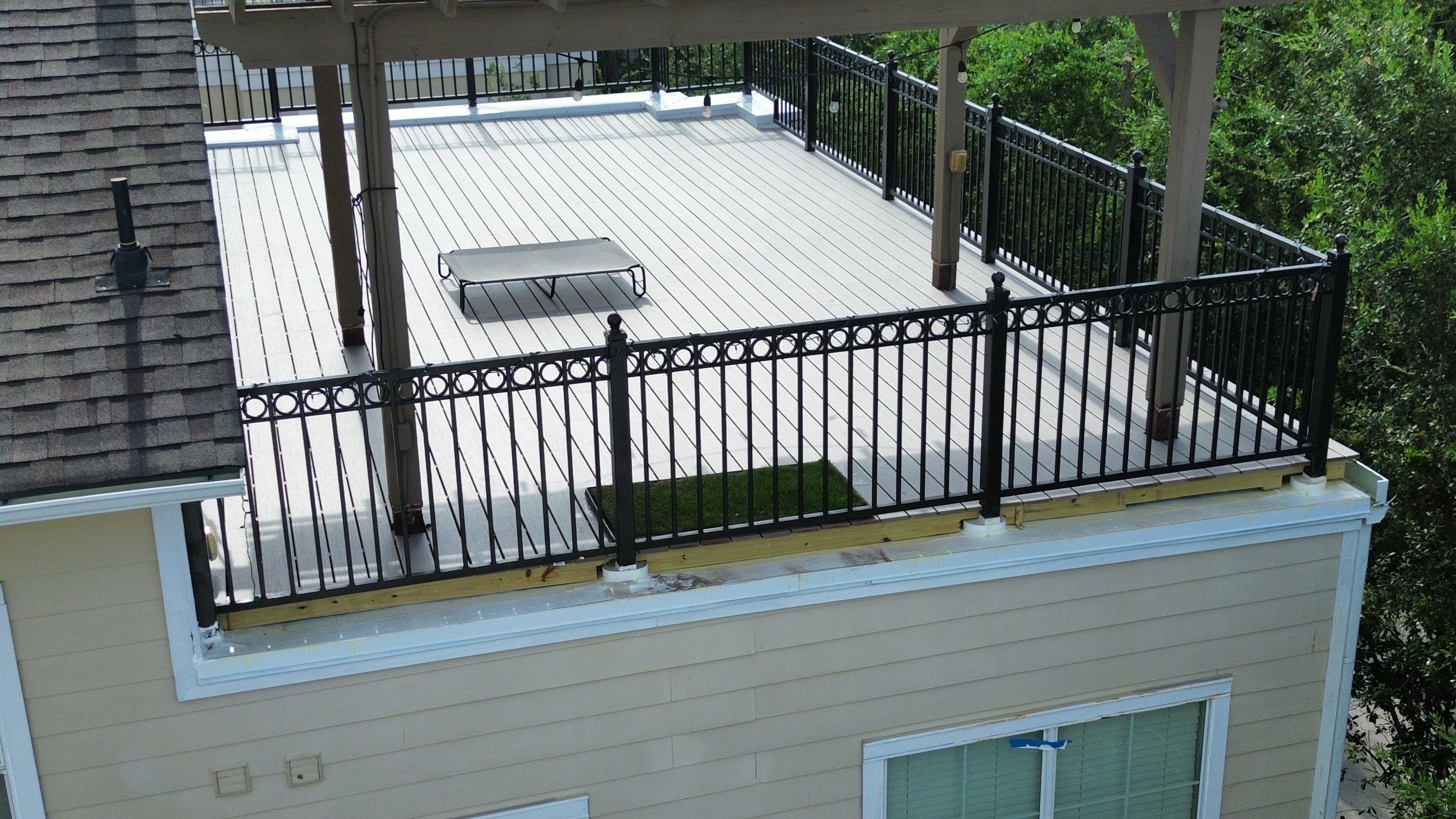 TREX Deck Patio by Houston Roofing & Construction