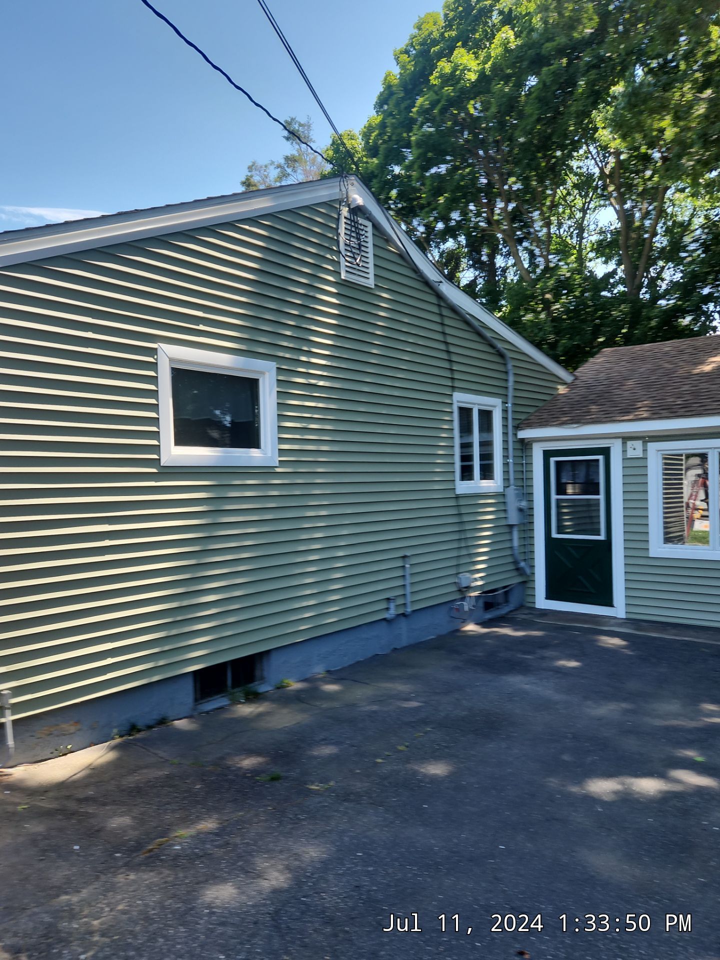 Siding Installation using Clapboard Monogram D4 Cypress by A Plus Exterior