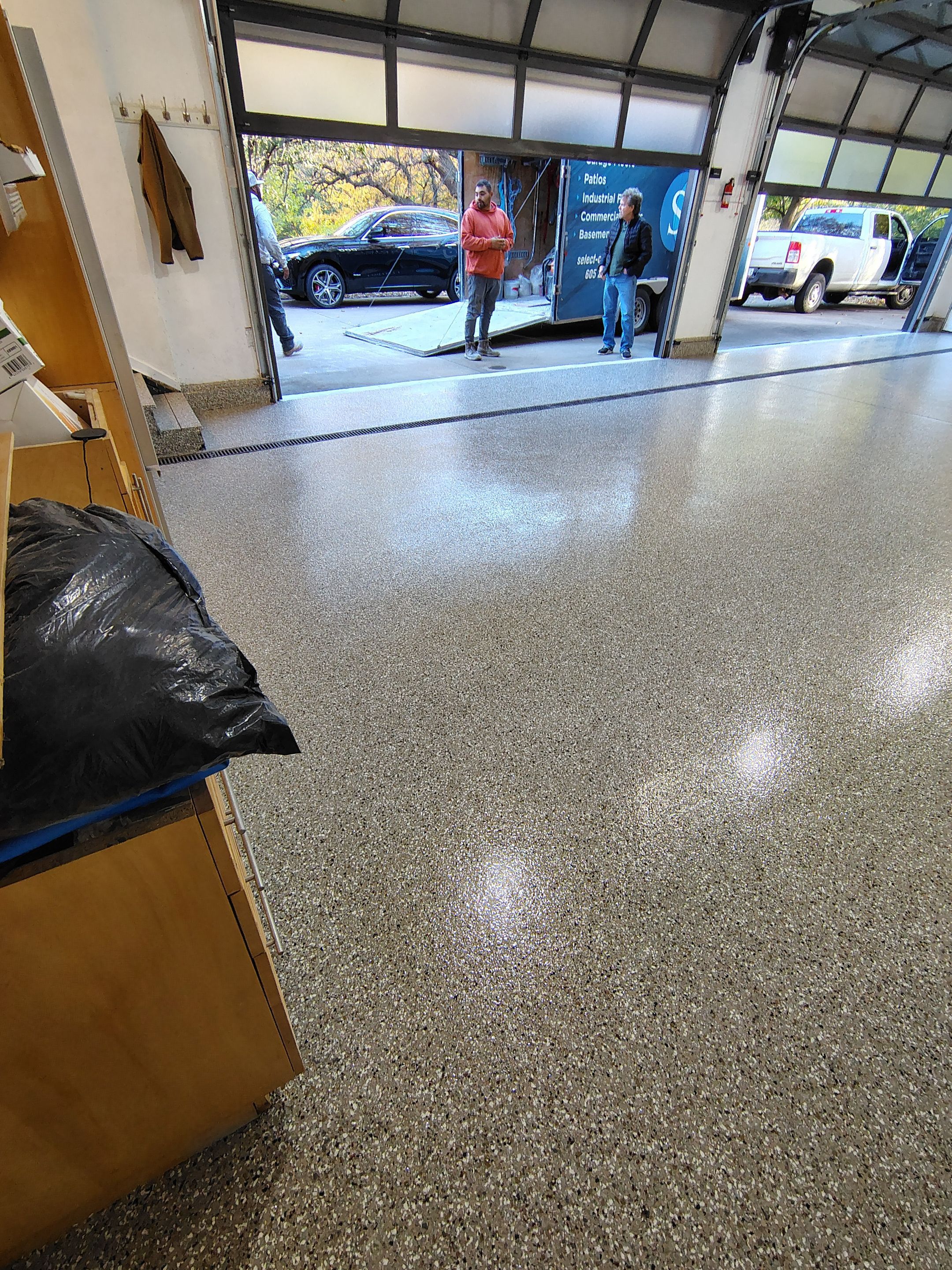 Garage Floor and Entry Step Concrete Coating in Sioux Falls by Select Painting, Coatings & Garage Cabinets