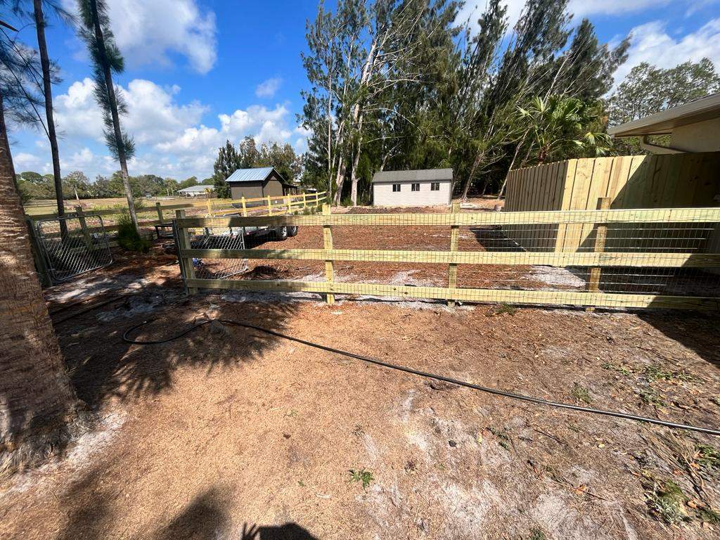 Custom Wood Farm Fence with Welded Wire Mesh in Nokomis by True Fence LLC