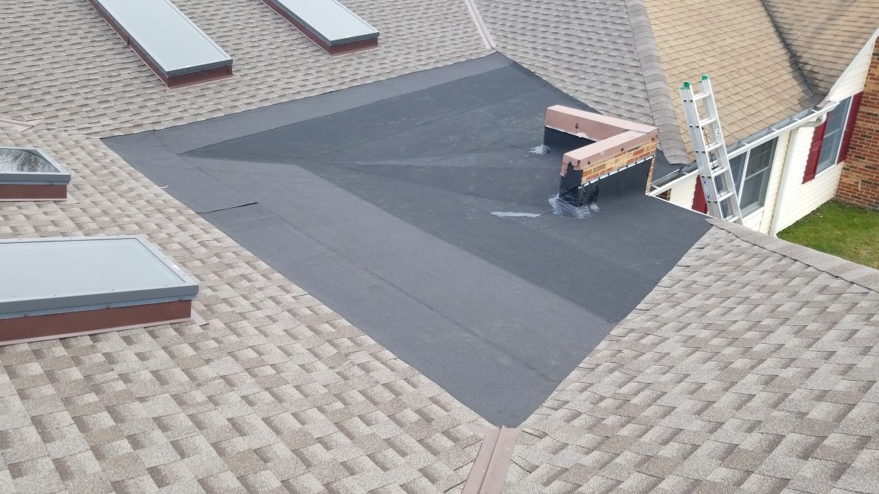 Skylight removal and install  by Absolute Roofing and Construction