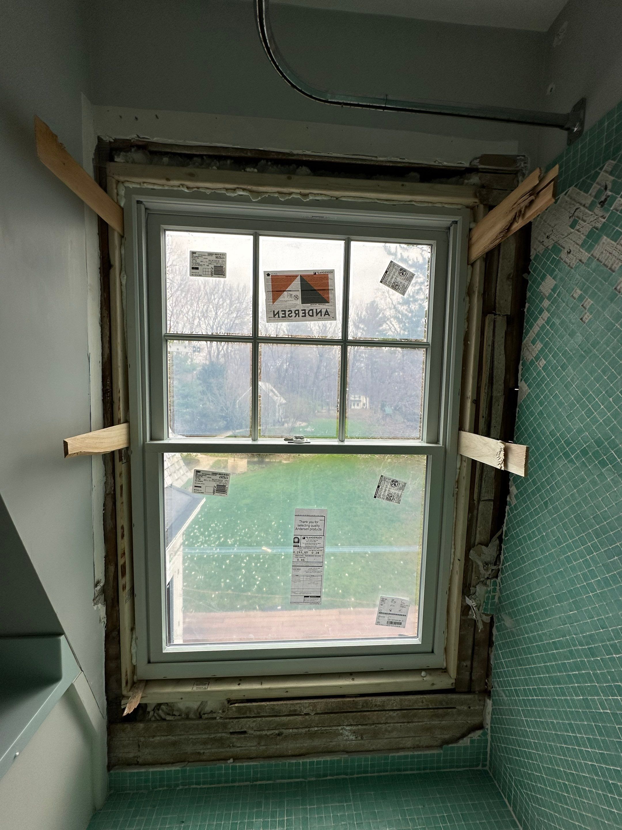 White cedar shingles and windows in Wayland, MA by UBrothers Construction