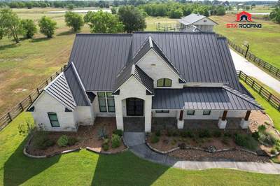 Residential Roofing Installation using Stamding Seam Metal
