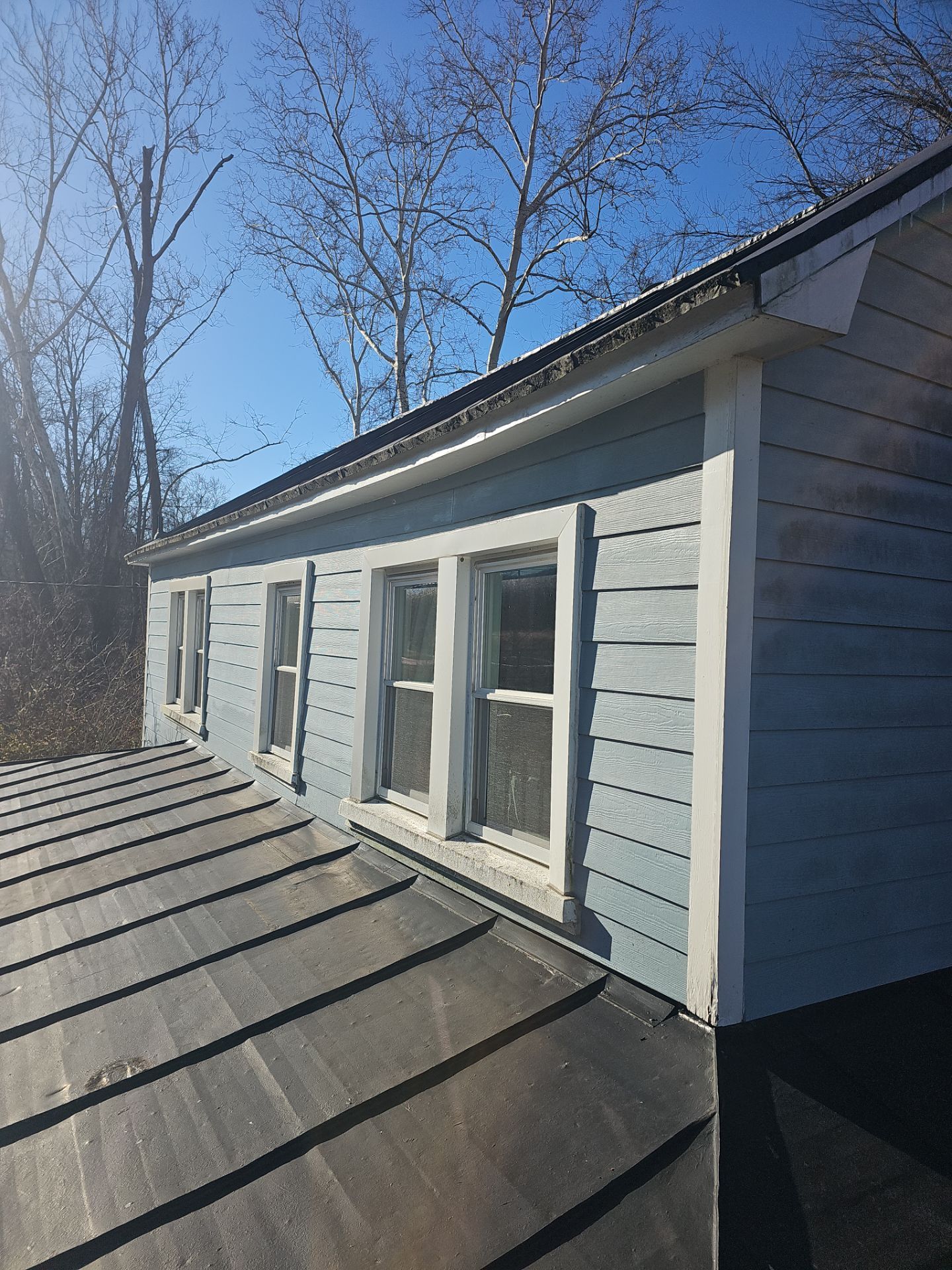Metal Roof Replacement by Winchester Roofing