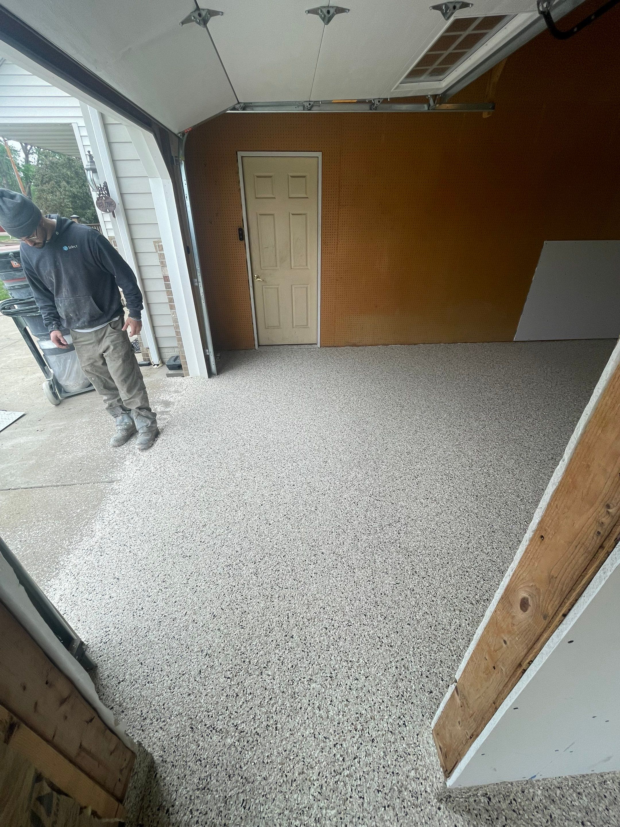 Speckled Epoxy Floor Coating Installation for Centerville Residential Garage by Select Painting, Coatings & Garage Cabinets