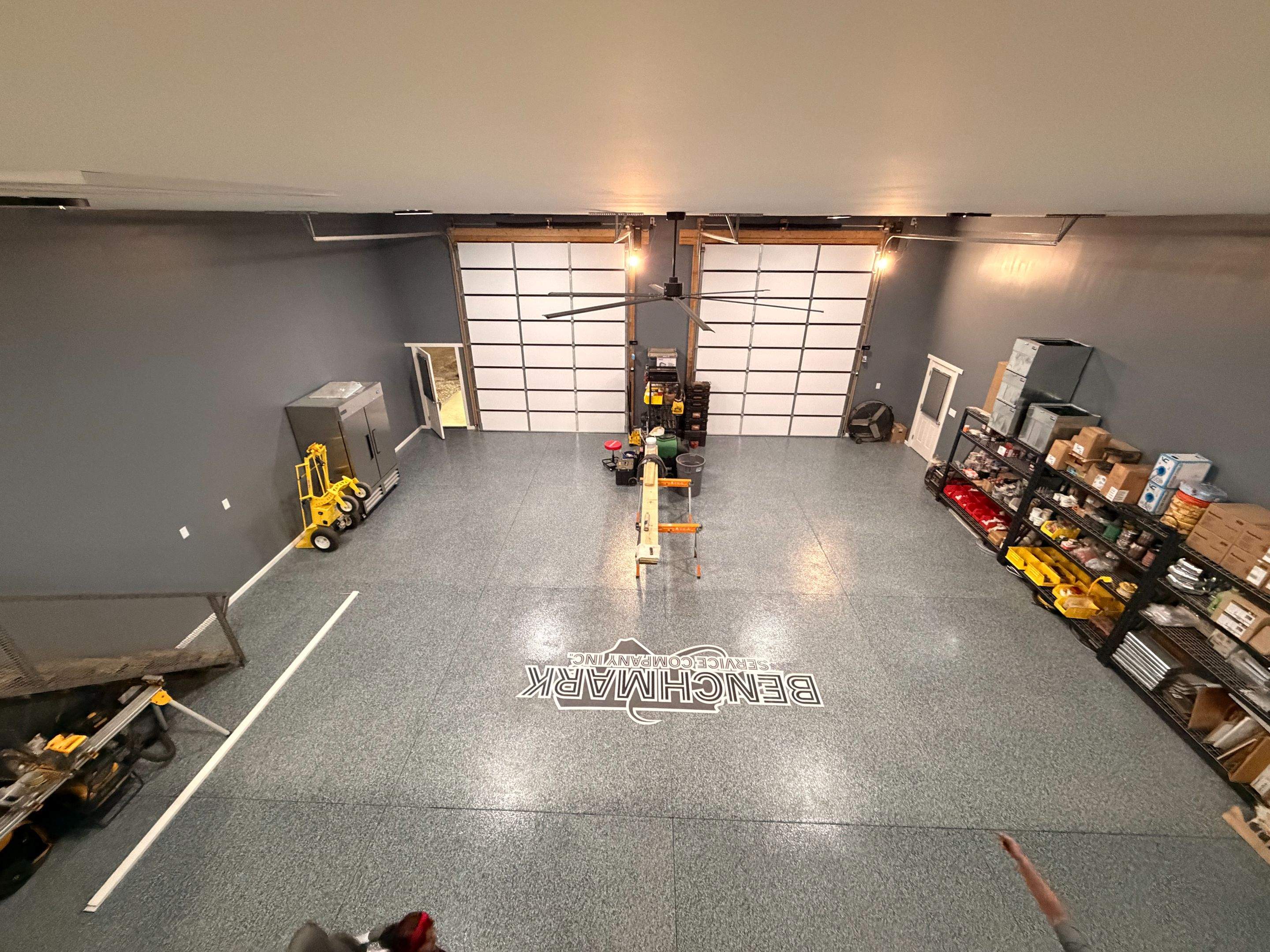 Custom Flake Floor and Company Logo by Endure Concrete Coatings