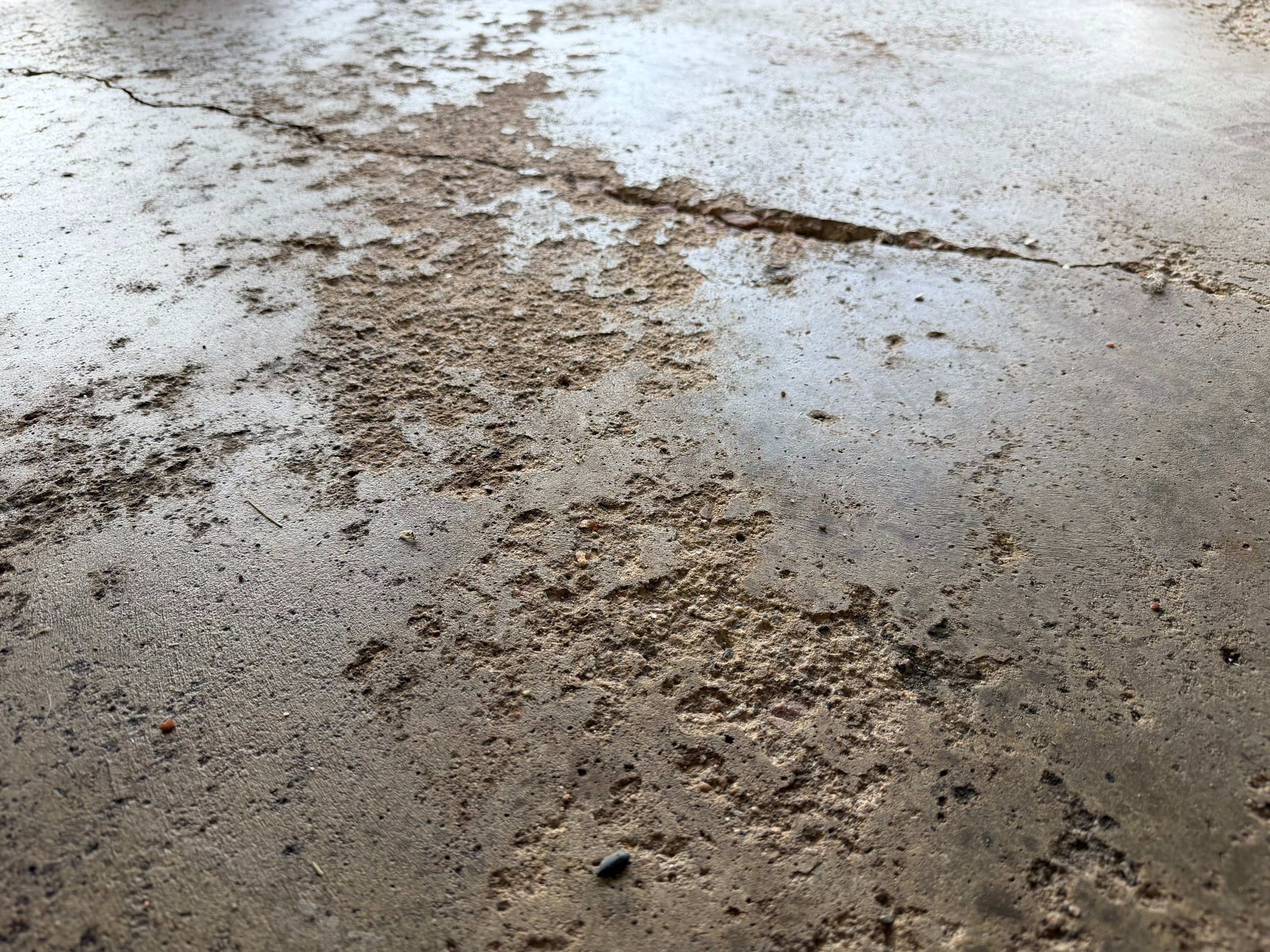 Sioux Falls Garage Epoxy Floor Installation and Concrete Crack Repair by Select Painting, Coatings & Garage Cabinets