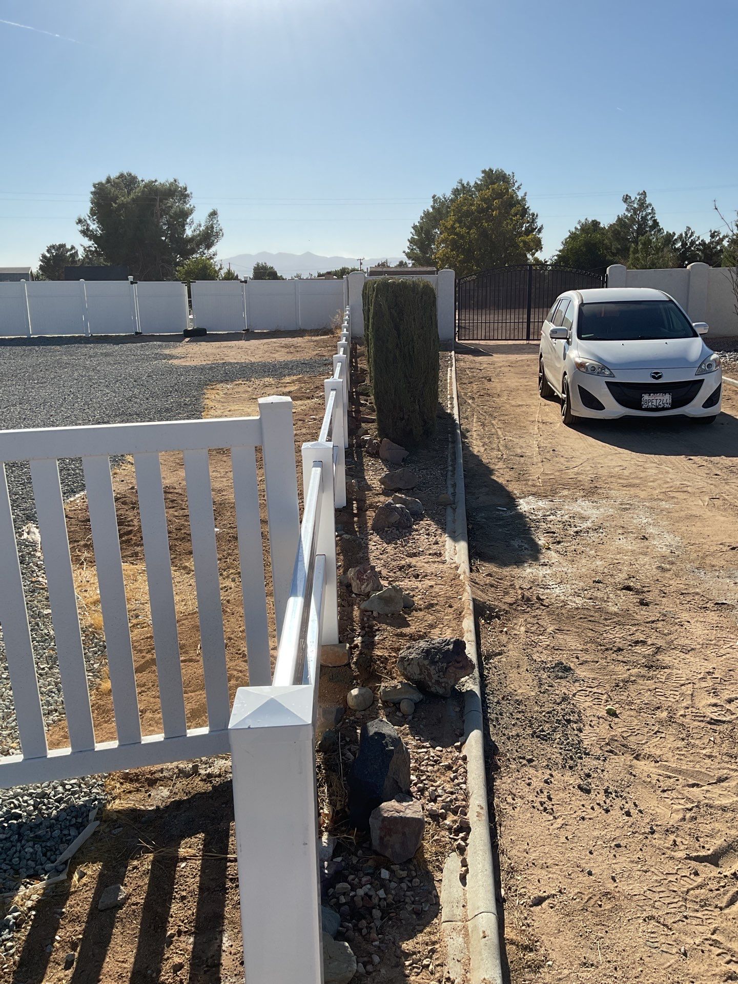 Fence Installation using Ranch Style Vinyl by Fence Guys Inc. 