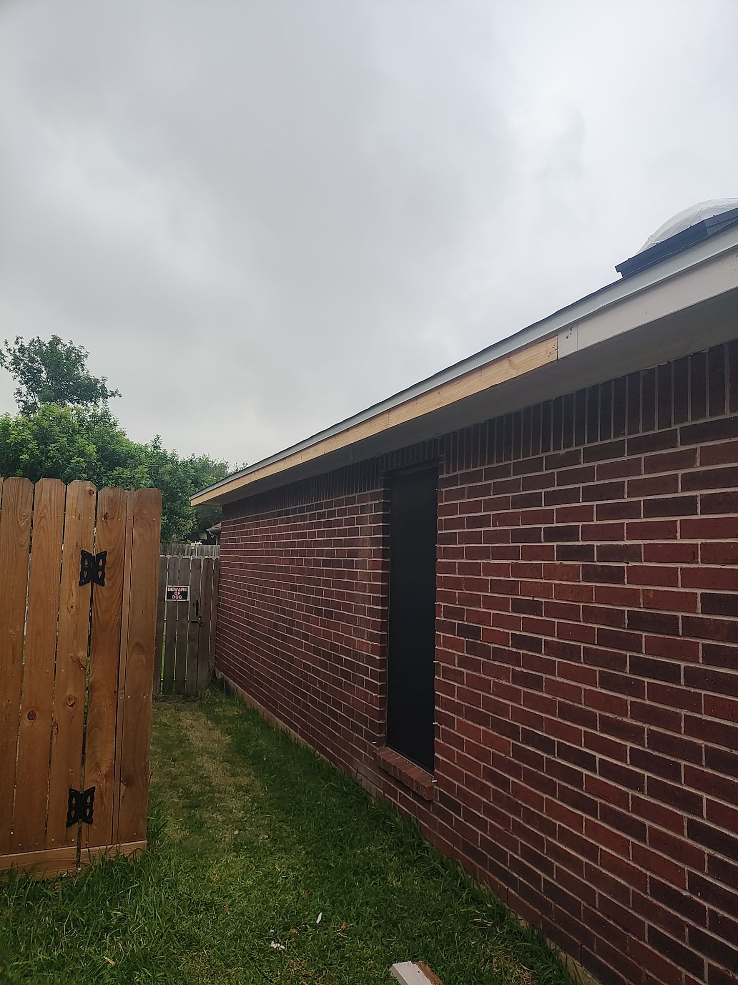Nothing looks nicer than a little black roof by Bayfront Roofing and Construction