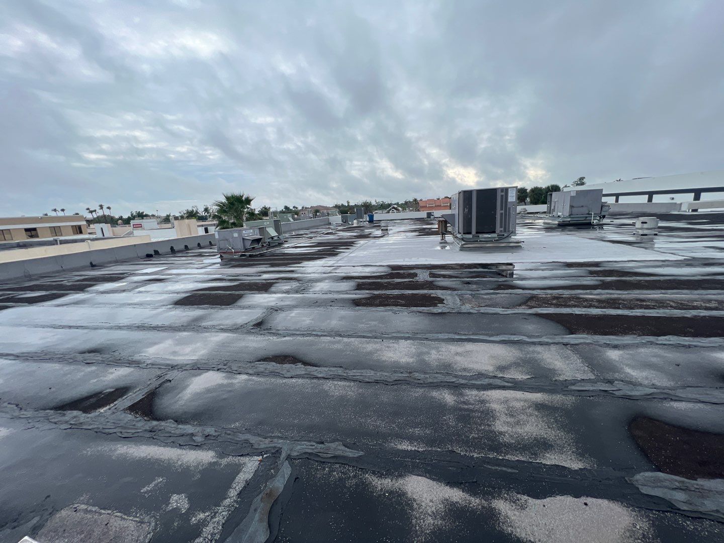 Commercial Roofing Repair using Roof Sealant by Four Peaks Roofing