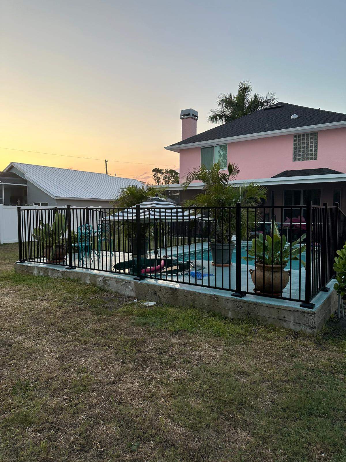 Black Aluminum Pool Fence Installation in Port Charlotte by True Fence LLC