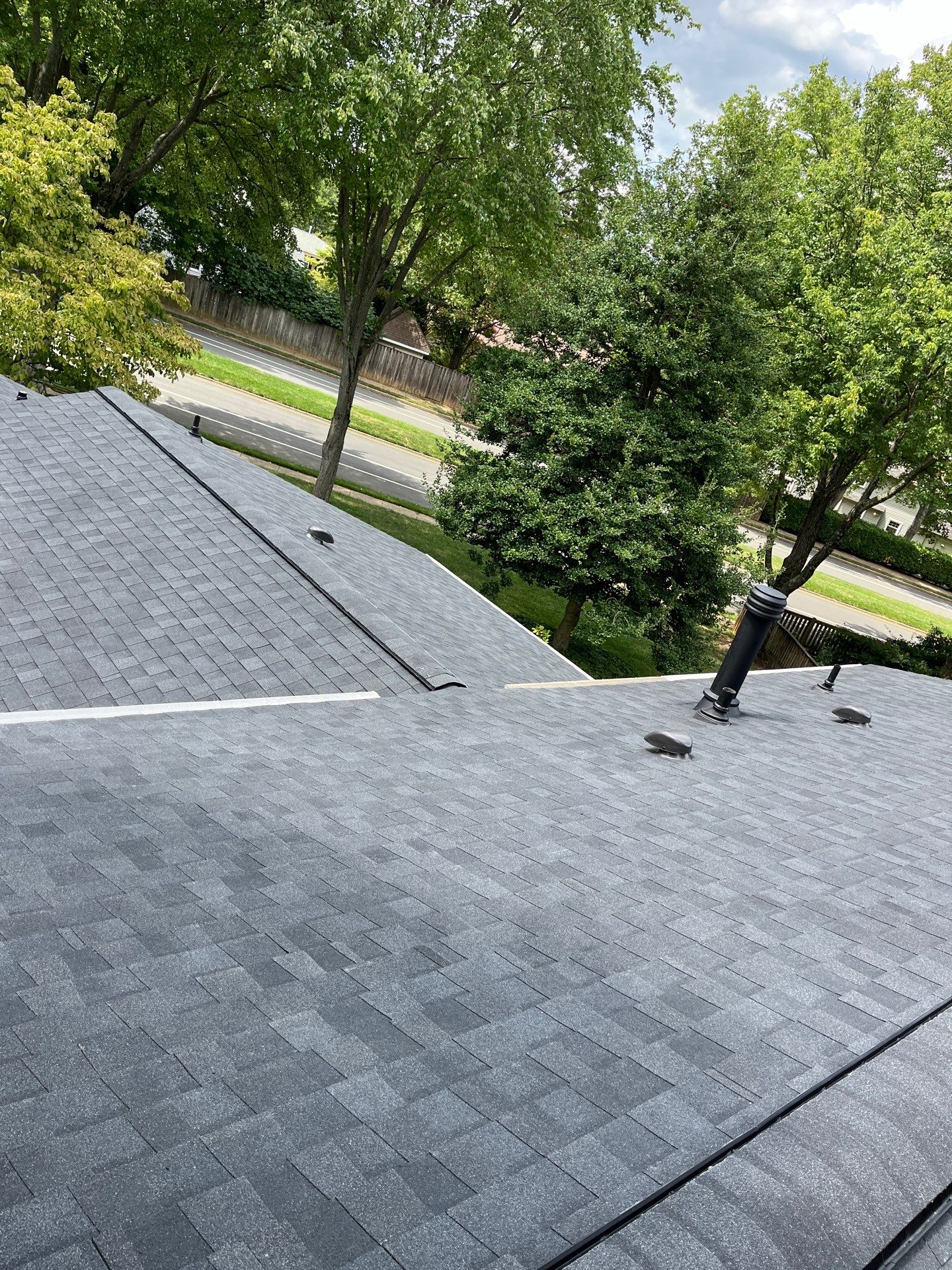 Vienna: Multi-Trade Restoration with CertainTeed Landmark Shingles in Charcoal Black by RM Banning, Inc.
