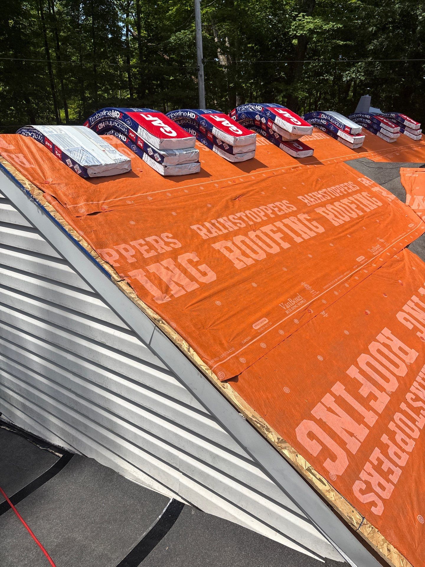 Residential Roofing Installation using GAF TImberline HDZ Hickory by Rainstoppers Roofing