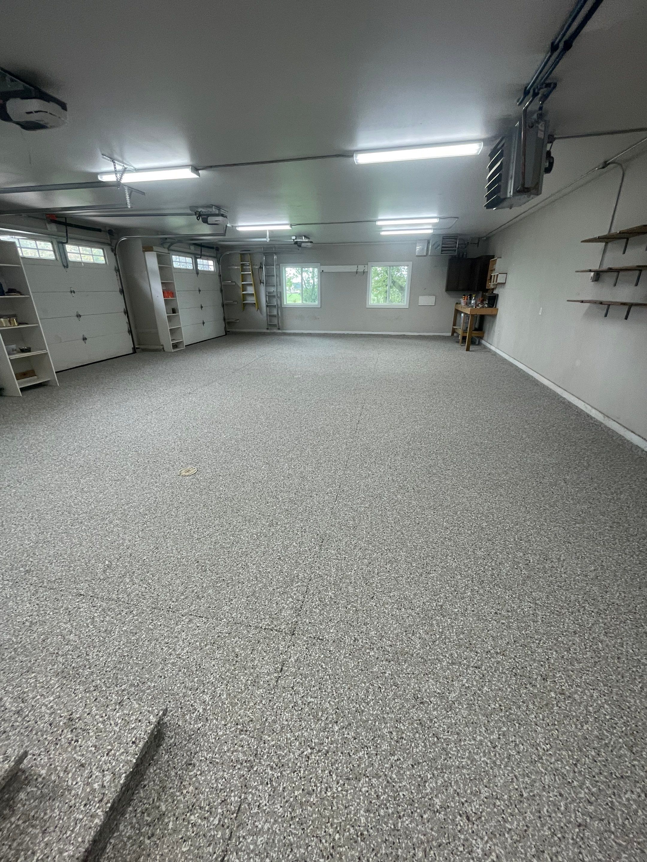 Grey Speckled Polyuera Garage Floor Coating for Hartford Three-Car Garage by Select Painting, Coatings & Garage Cabinets