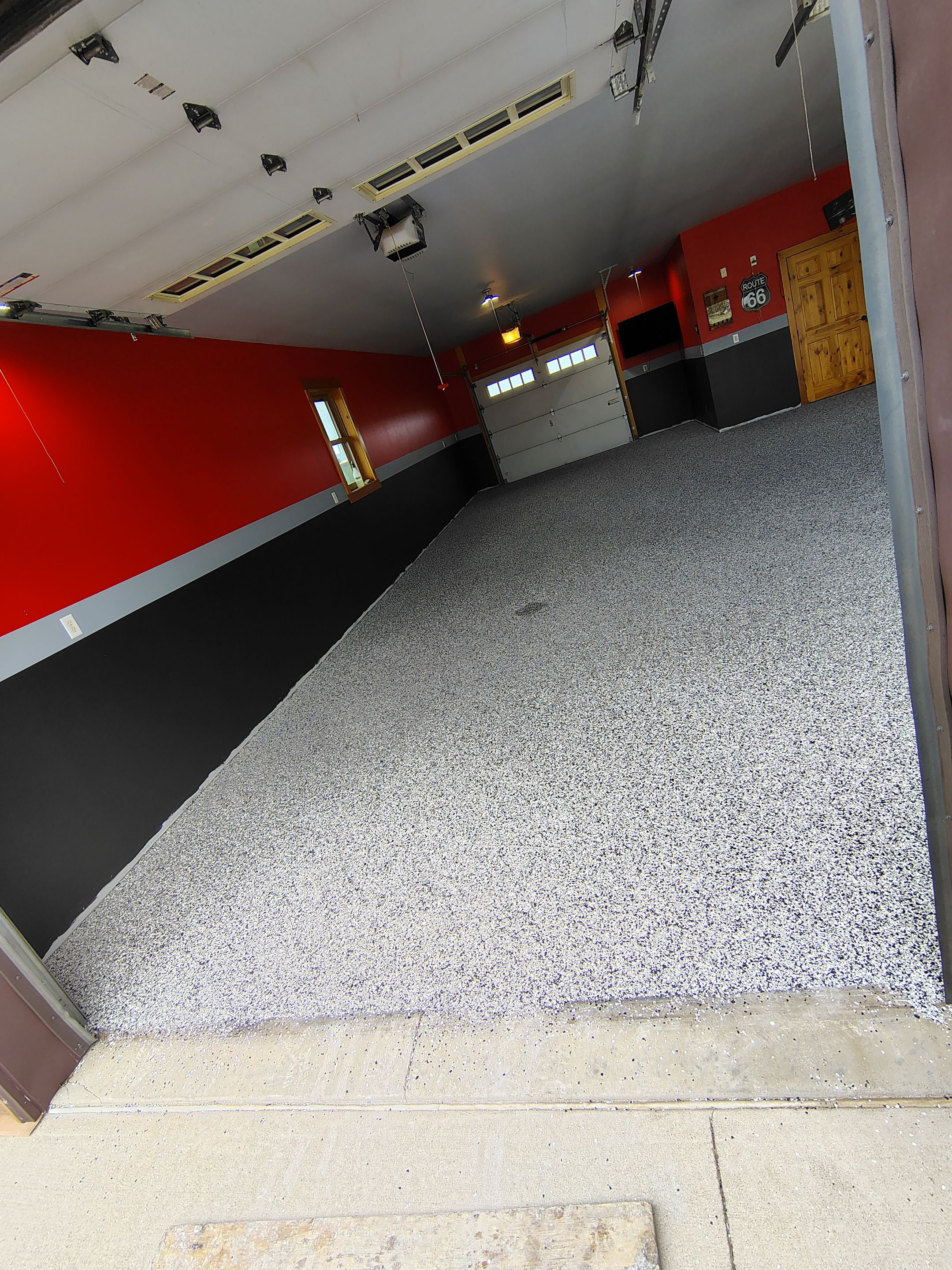 Multi-Car Garage Concrete Coating and Floor Refinishing in Hull by Select Painting, Coatings & Garage Cabinets