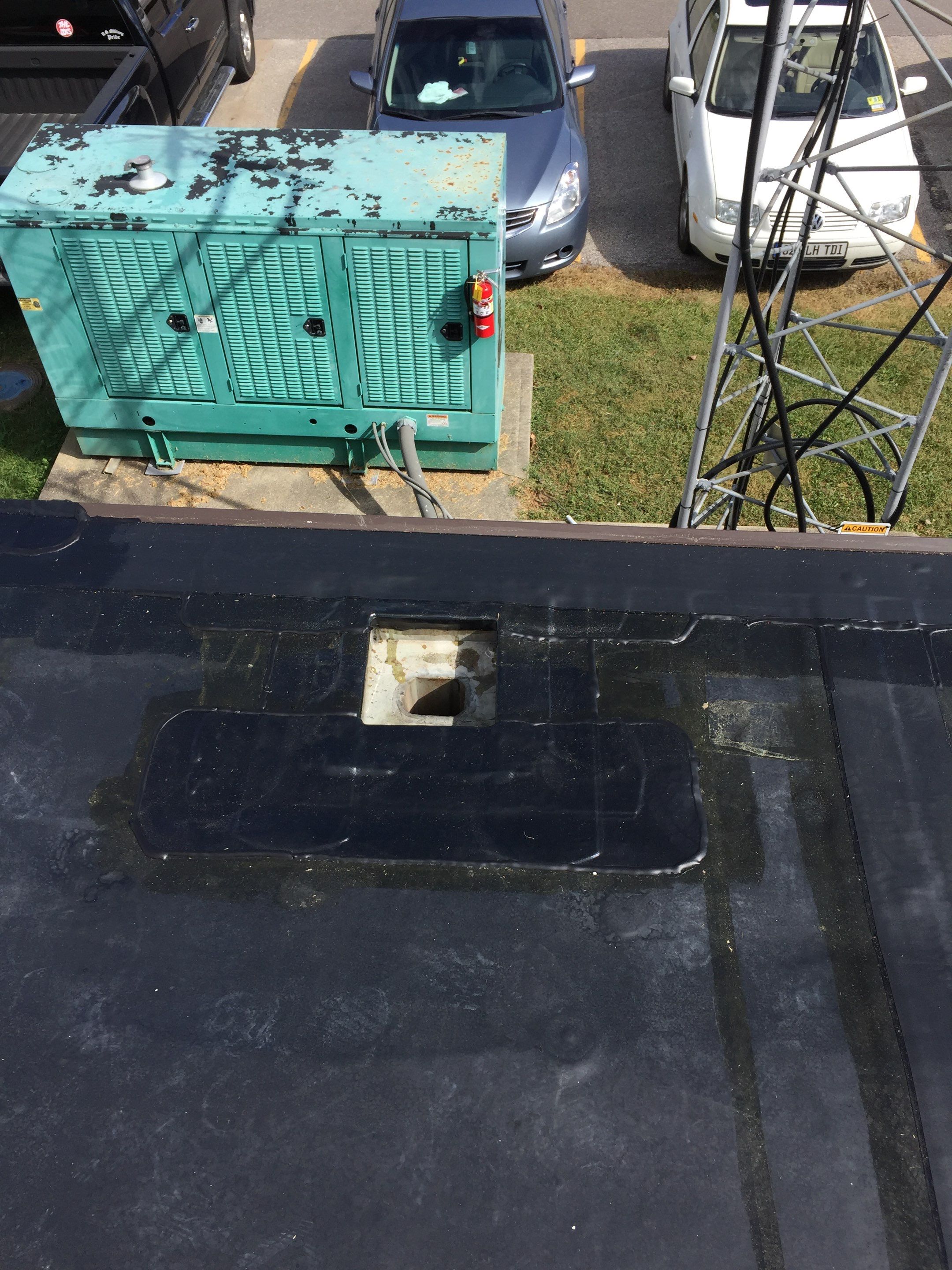 Commercial Rubber Roofing  using Carlisle Rubber Roofing System by Secure Construction Company Inc