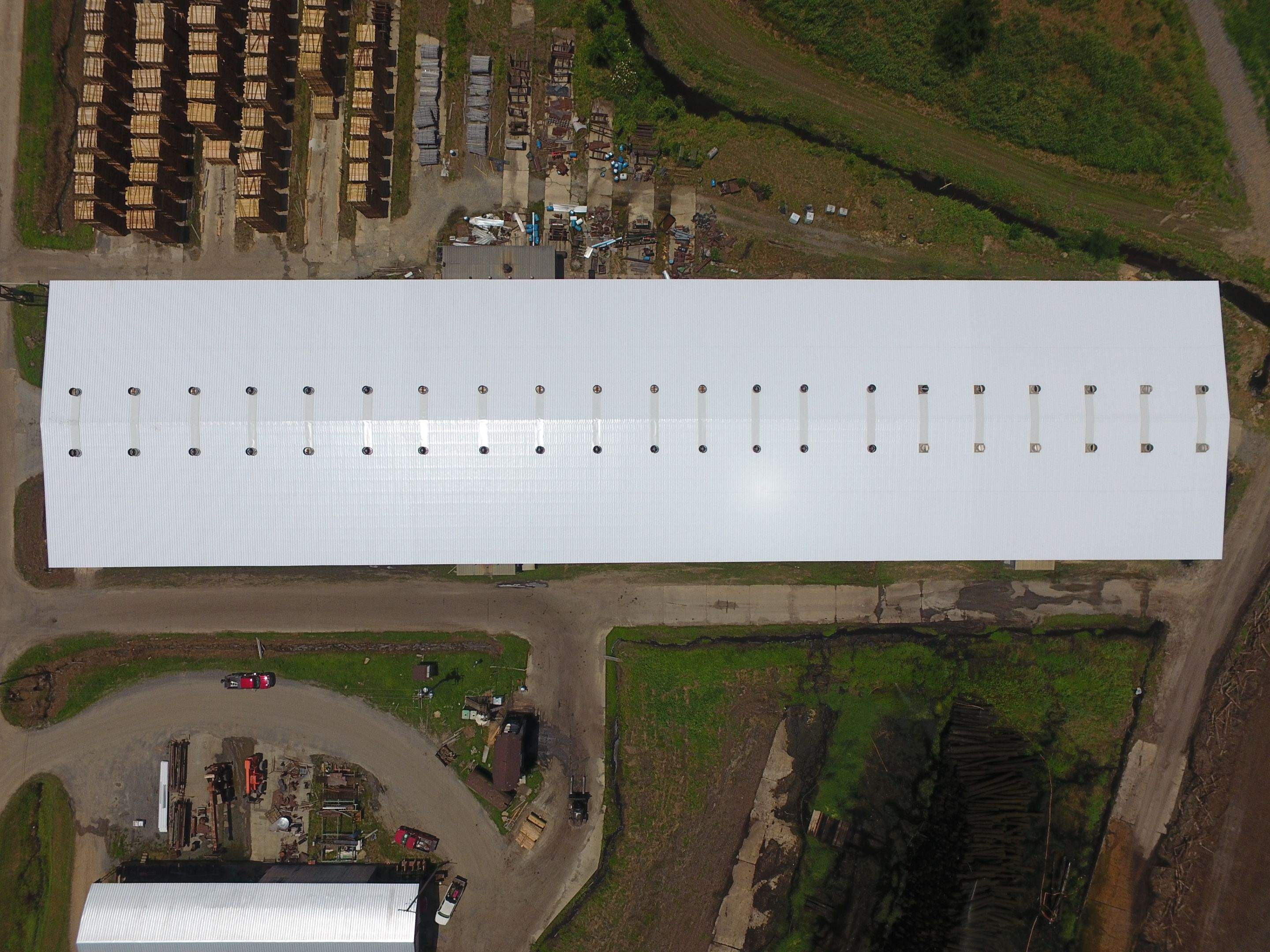 Commercial Roofing Installation using Aluminum Roofing panels by Hostetler Roofing