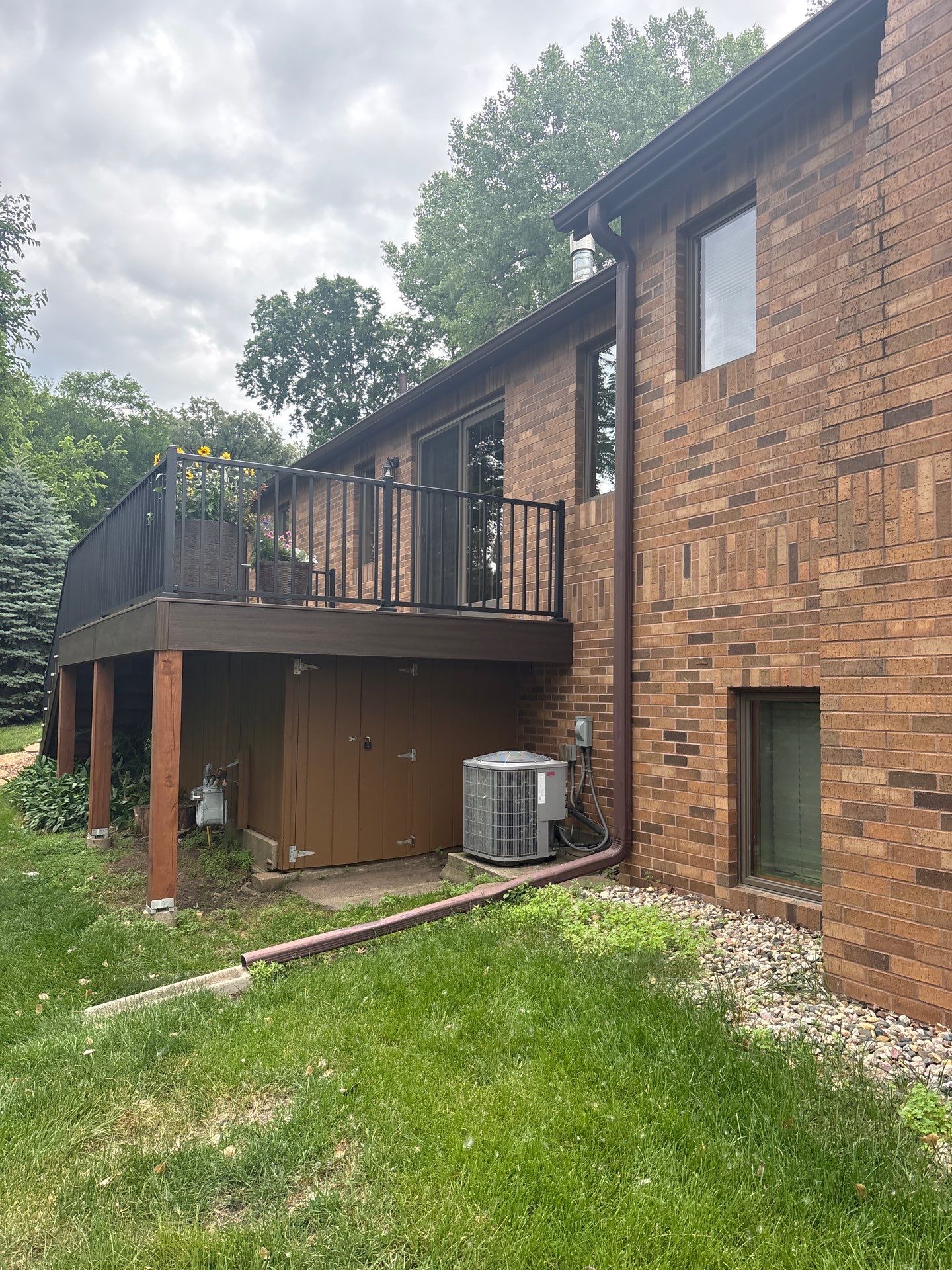 Sioux Falls Exterior Painting and Solid Color Deck Staining by Select Painting, Coatings & Garage Cabinets