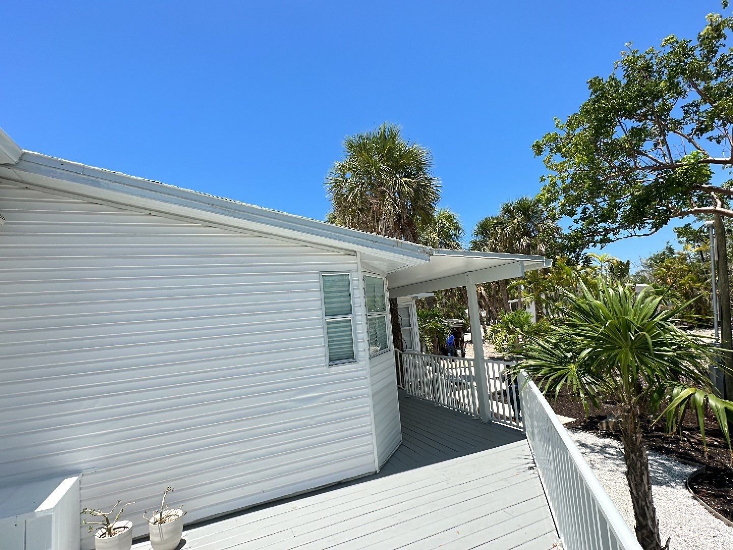 Downspout Installation using Charcoal Grey in Sanibel FL by Gutter Professors