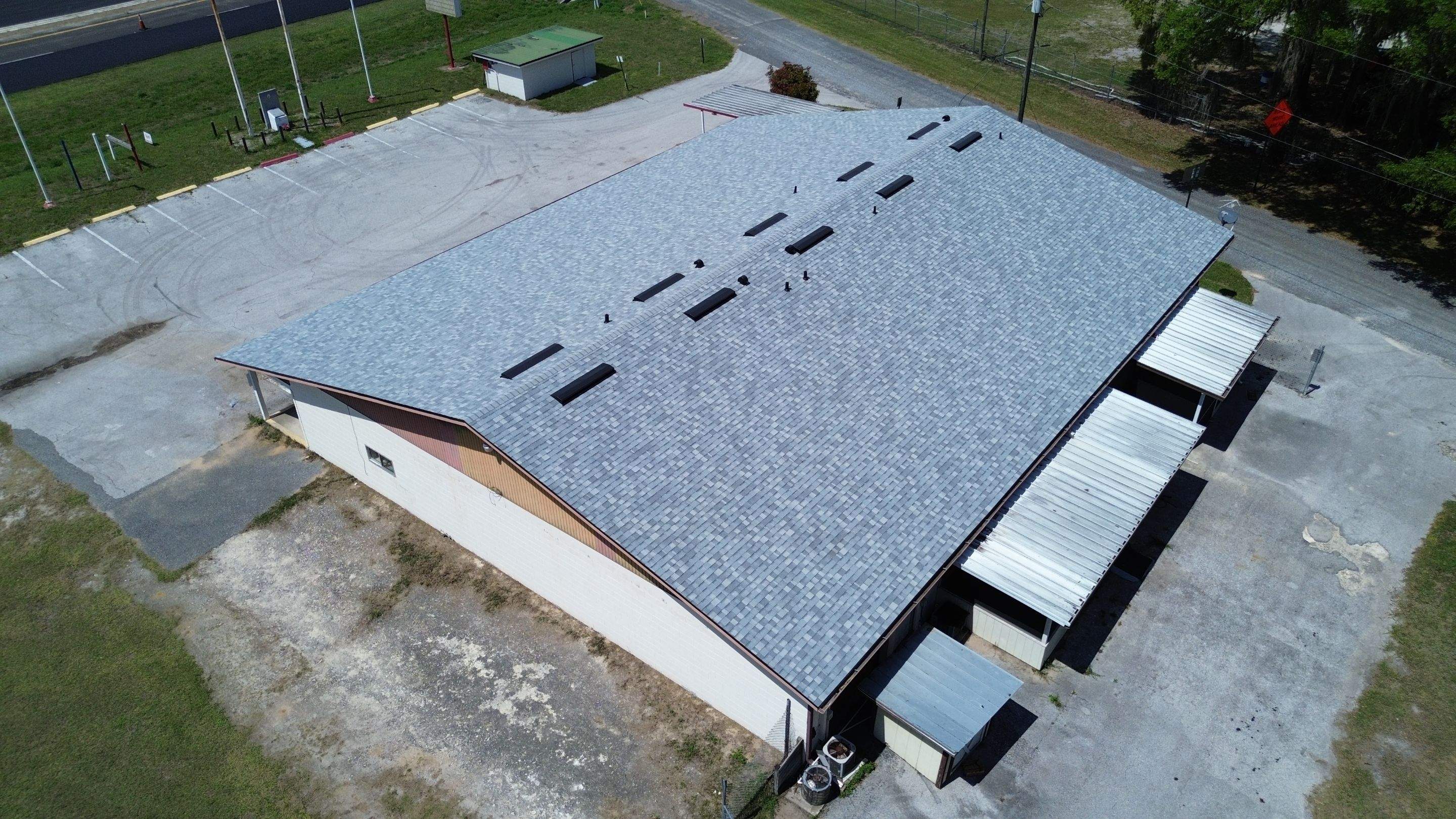 New Antique Silver Commercial Roof Replacement in Reddick, FL by Brehm Roofing
