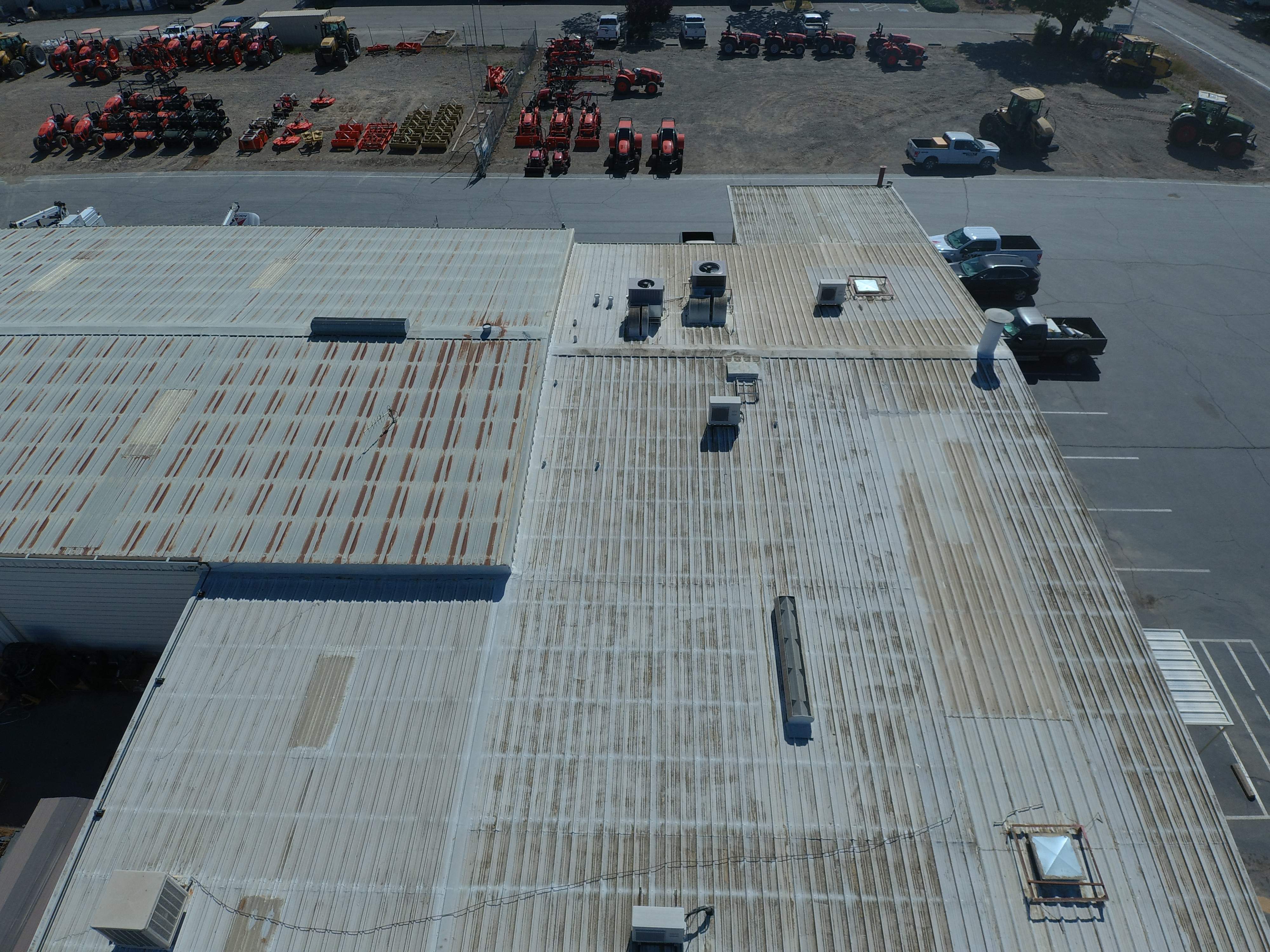 Spray foam and coatings using Conklin Benchmark/PUMA XL coatings and spray foam by Straight Edge Roofing Inc