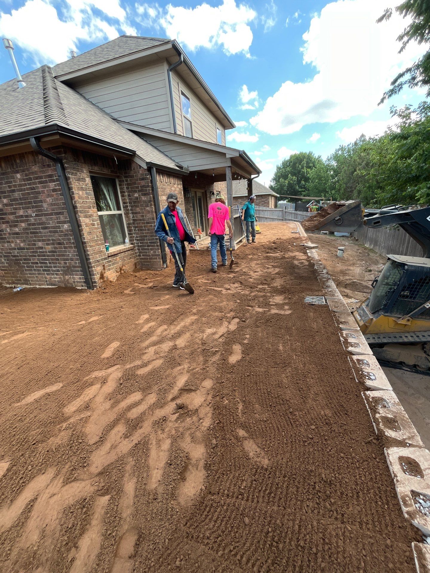Custom Segmental Block Retaining Wall and Sod Installation in Lawton by Clays Services Inc