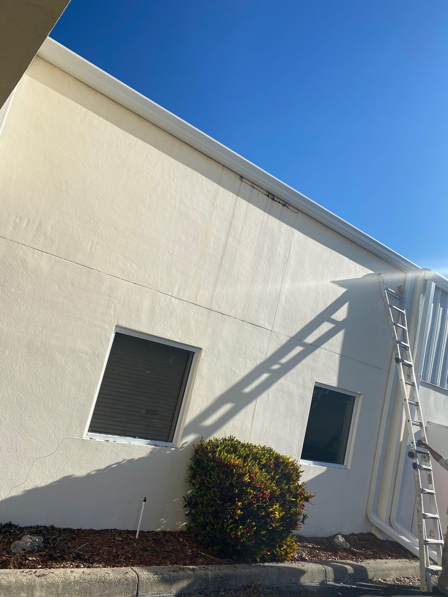 White 6-Inch Gutters with Downspouts in Bradenton FL by Gutter Professors