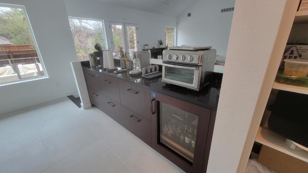Modern & Clean Kitchen by SLM General Contractors & Roofing