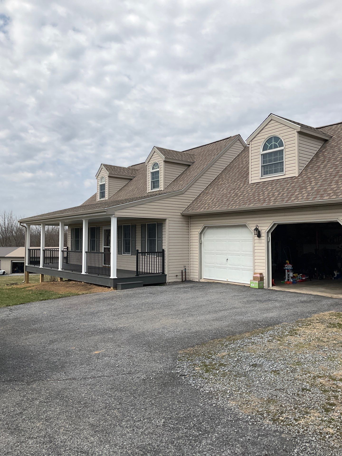 Custom Porch Roof Addition and Siding Renovation in Myerstown, PA by Esh Builders