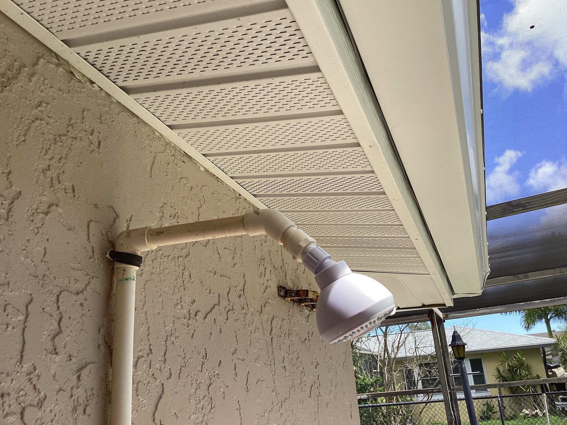 White Seamless Gutters and Splash Guards in Fort Myers FL by Gutter Professor by Gutter Professors