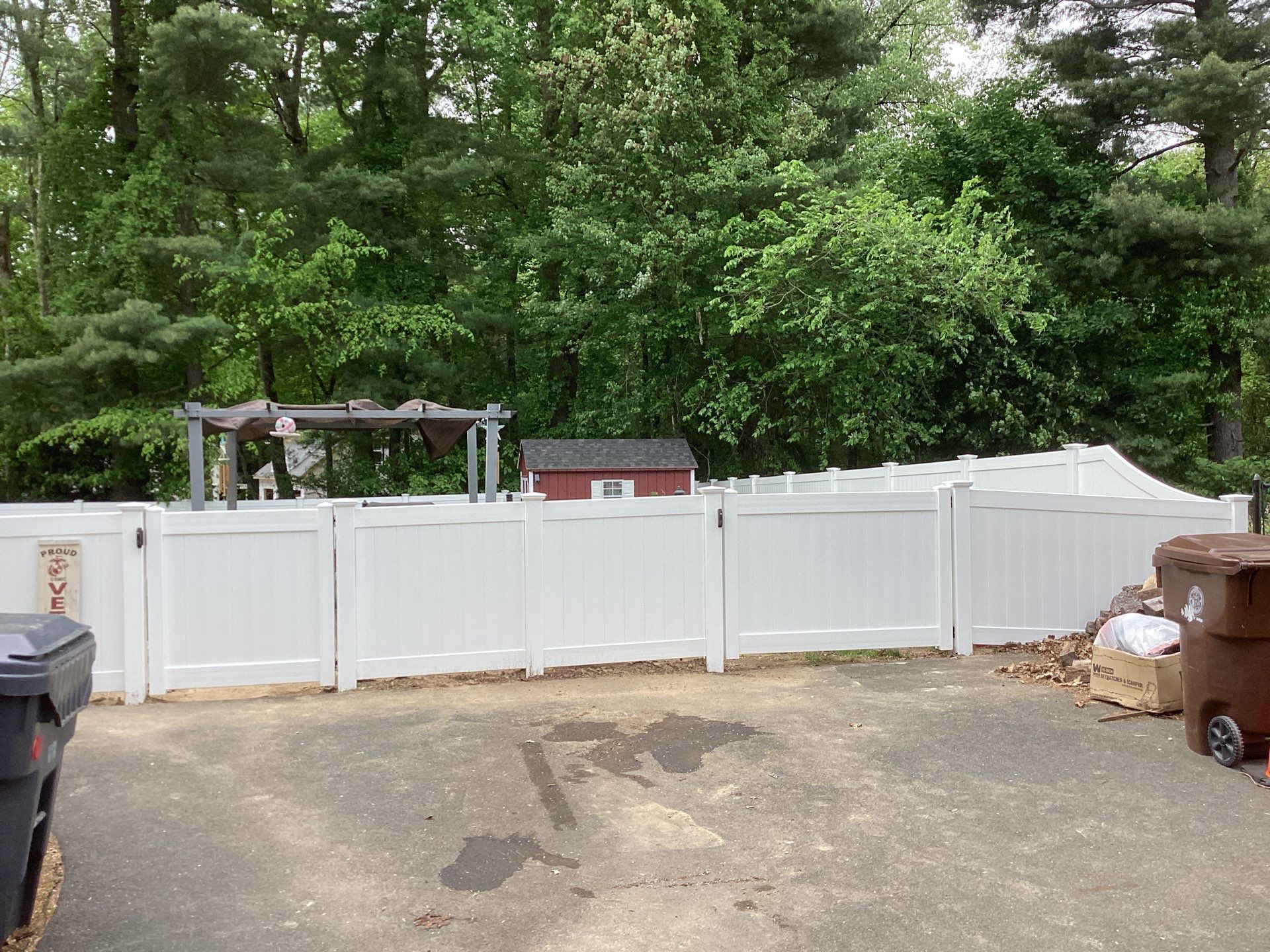 Replacement fence with White Vinyl Privacy and matching gates.  by DiGiorgi Roofing and Siding Inc