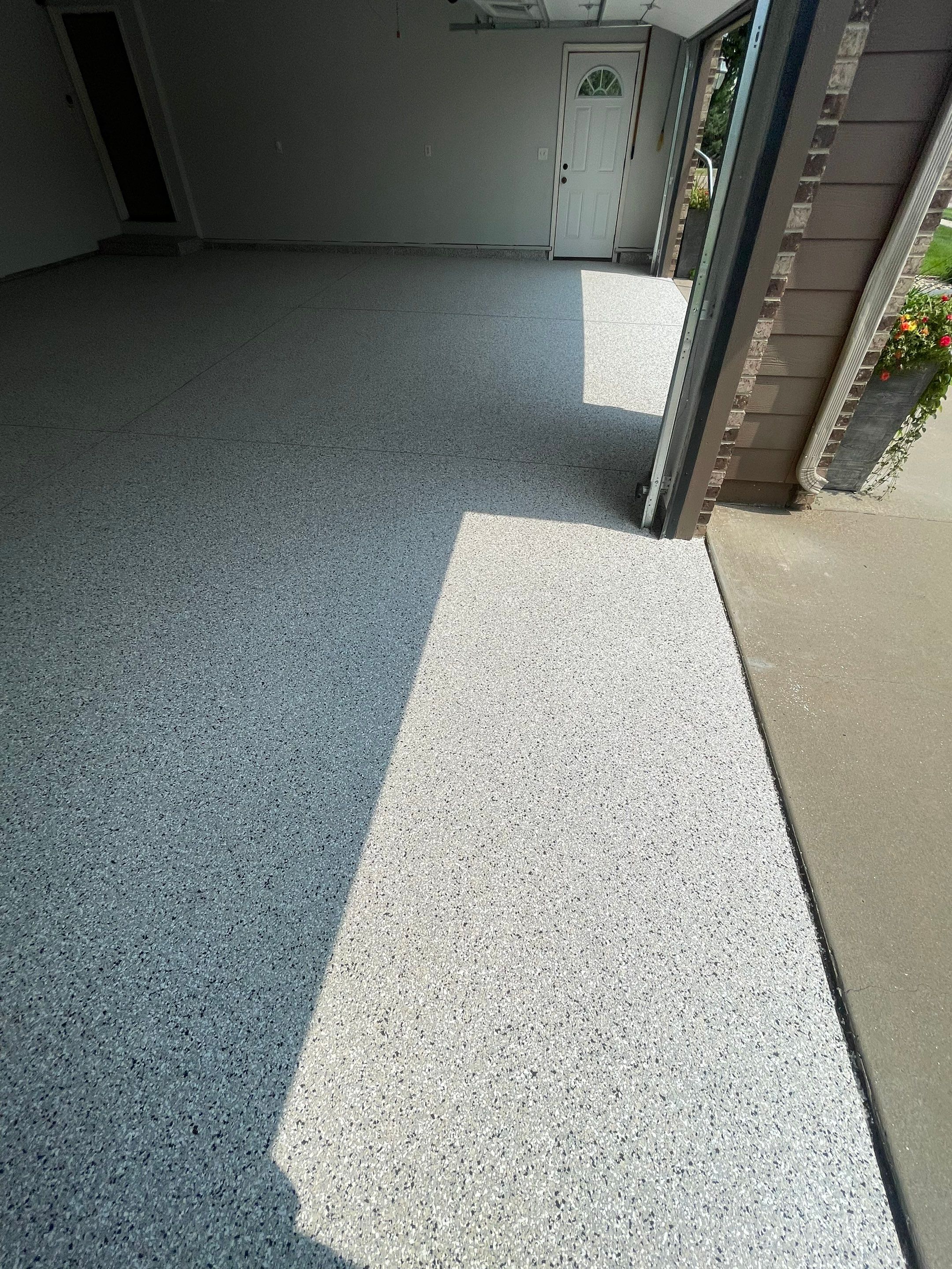 Multi-Car Garage Floor Coating and Crack Repair in Tea by Select Painting, Coatings & Garage Cabinets