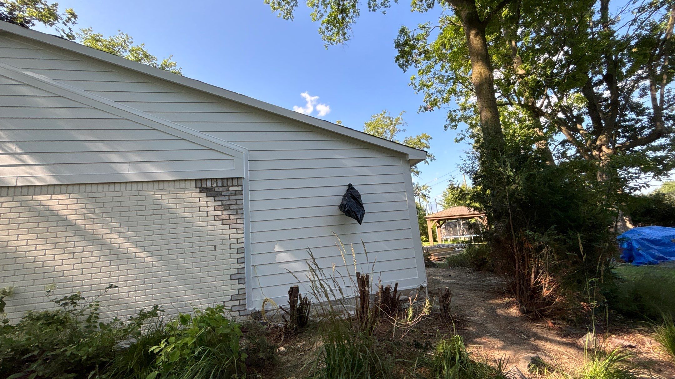 Siding Replacement using Hardie Plank S8 1/4"  Arctic White by 180 Contractors