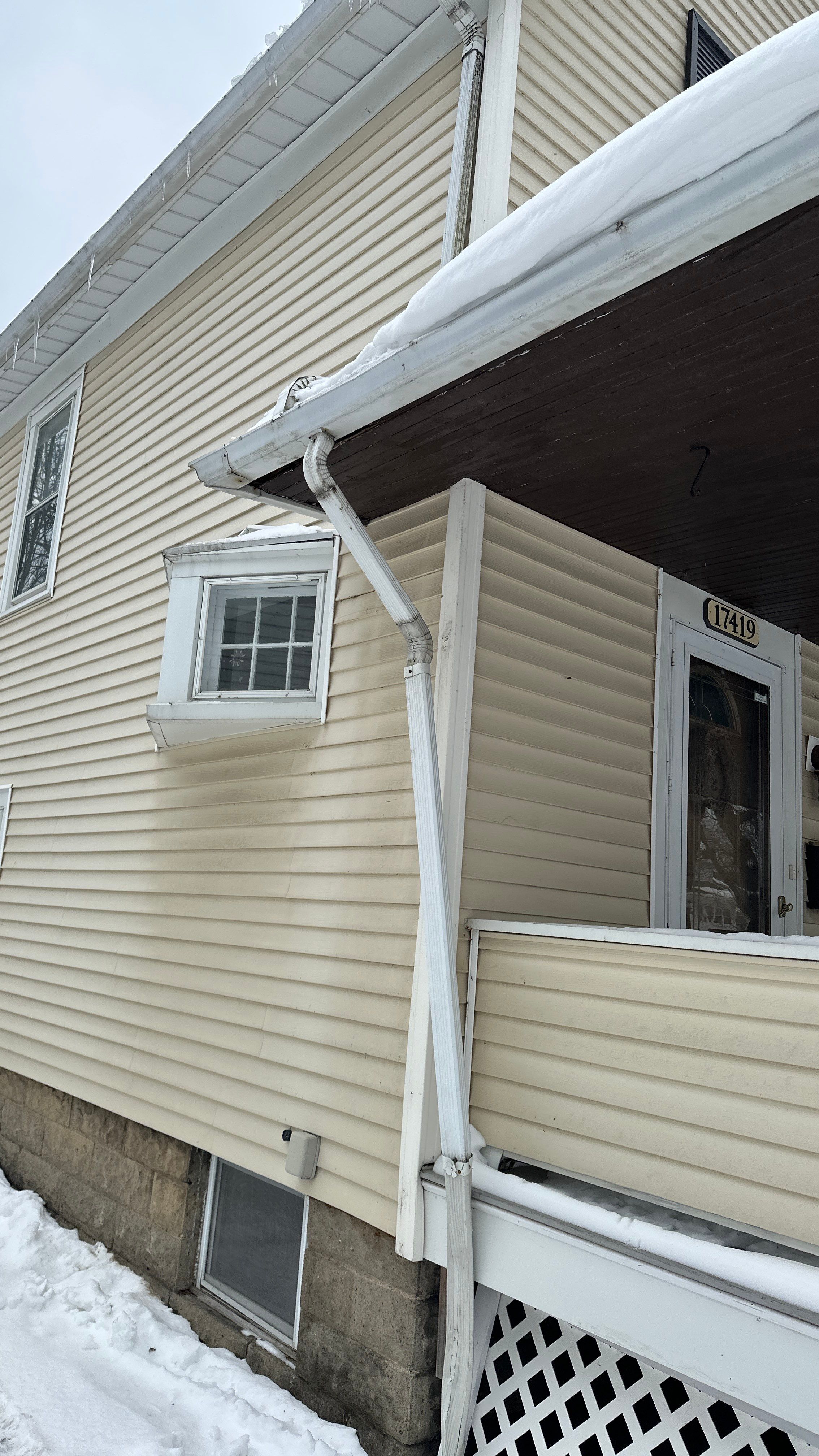 Downspout repair by Homestyle in Lakewood by Homestyle Home Improvements (HHI)