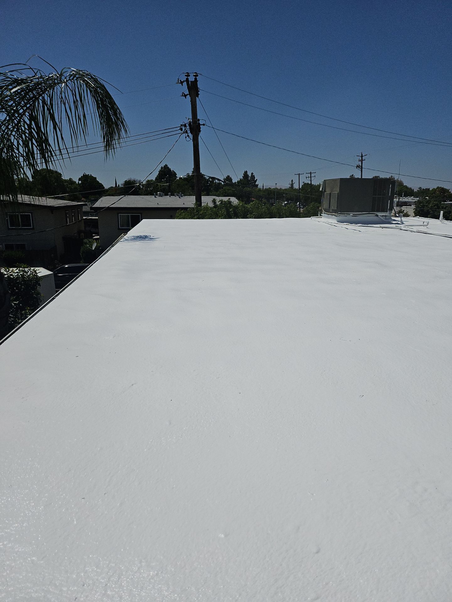 Foam Refurbish using General Coatings acrylic coatings and spray foam by Straight Edge Roofing Inc
