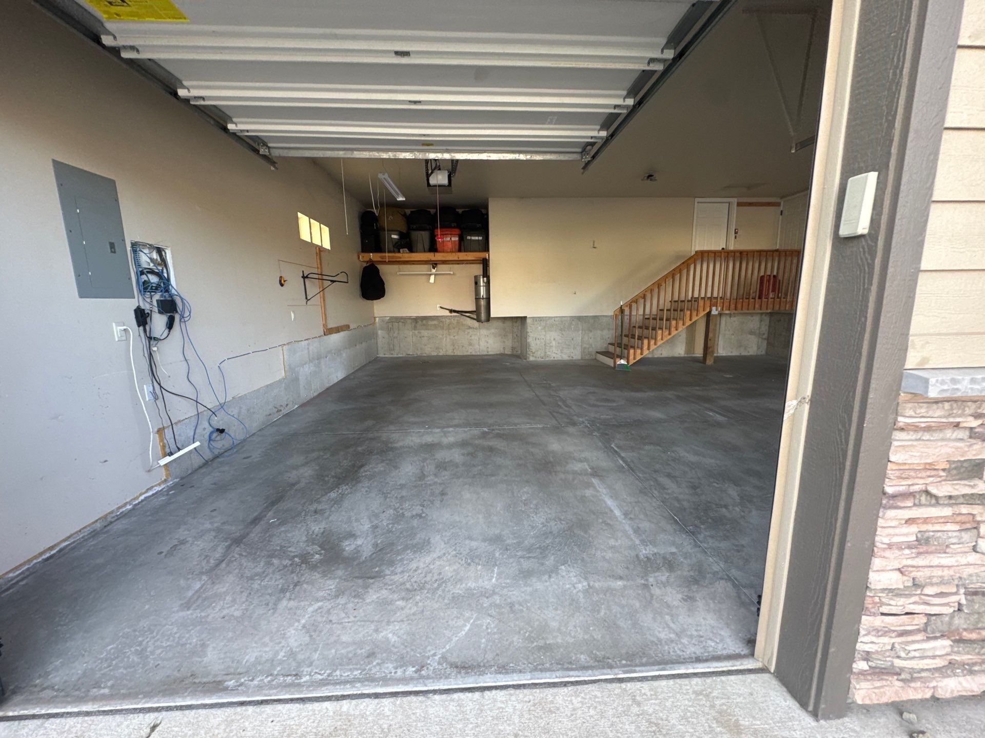 Custom Gray Speckled Polyaspartic Garage Floor Coating in Cheney by Croc Coatings, LLC