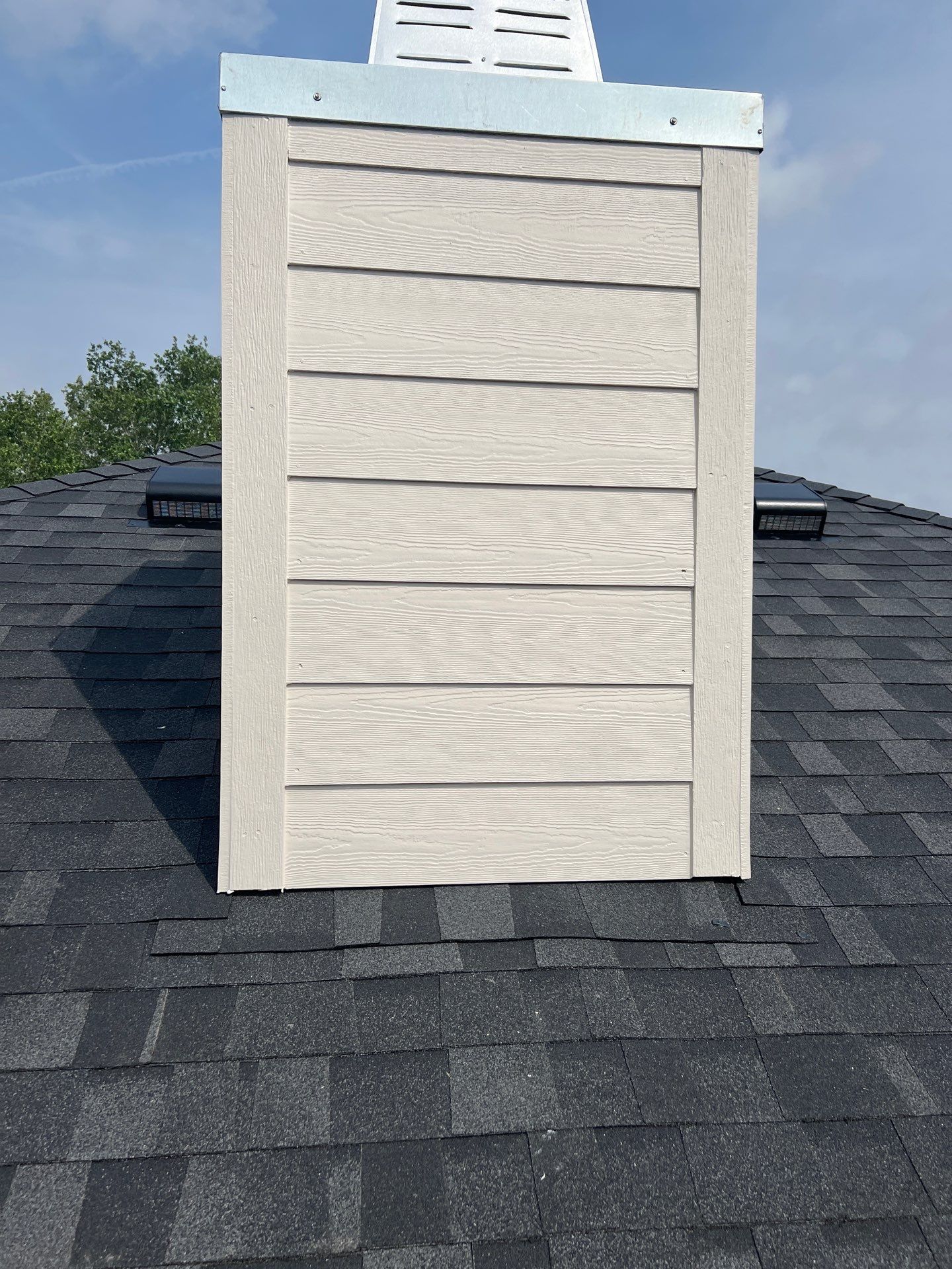 Nothing looks nicer than a little black roof by Bayfront Roofing and Construction