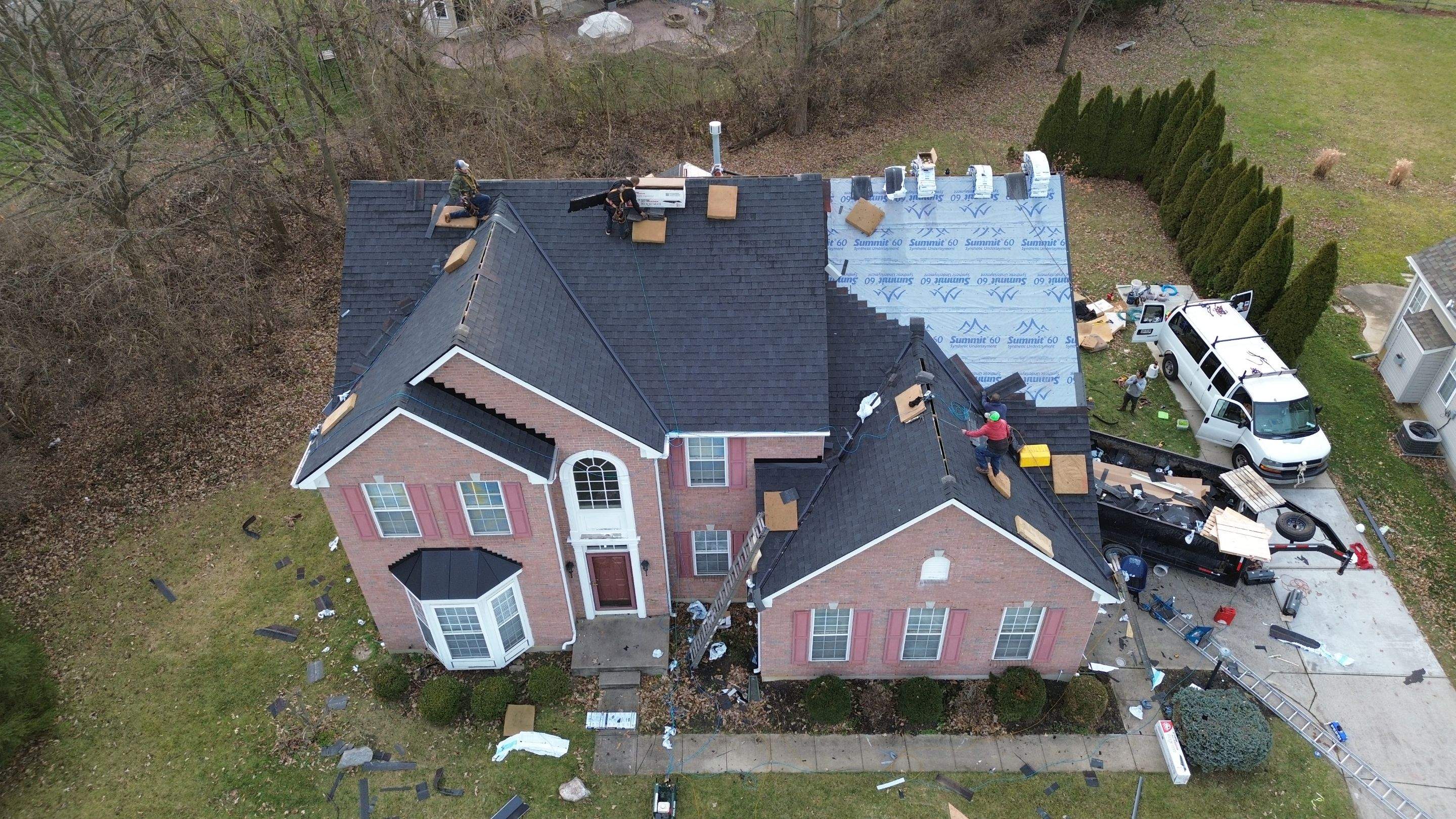 Walden Ponds - Pristine Black and Hydro Flo Gutter Guards by Tamlin Roofing