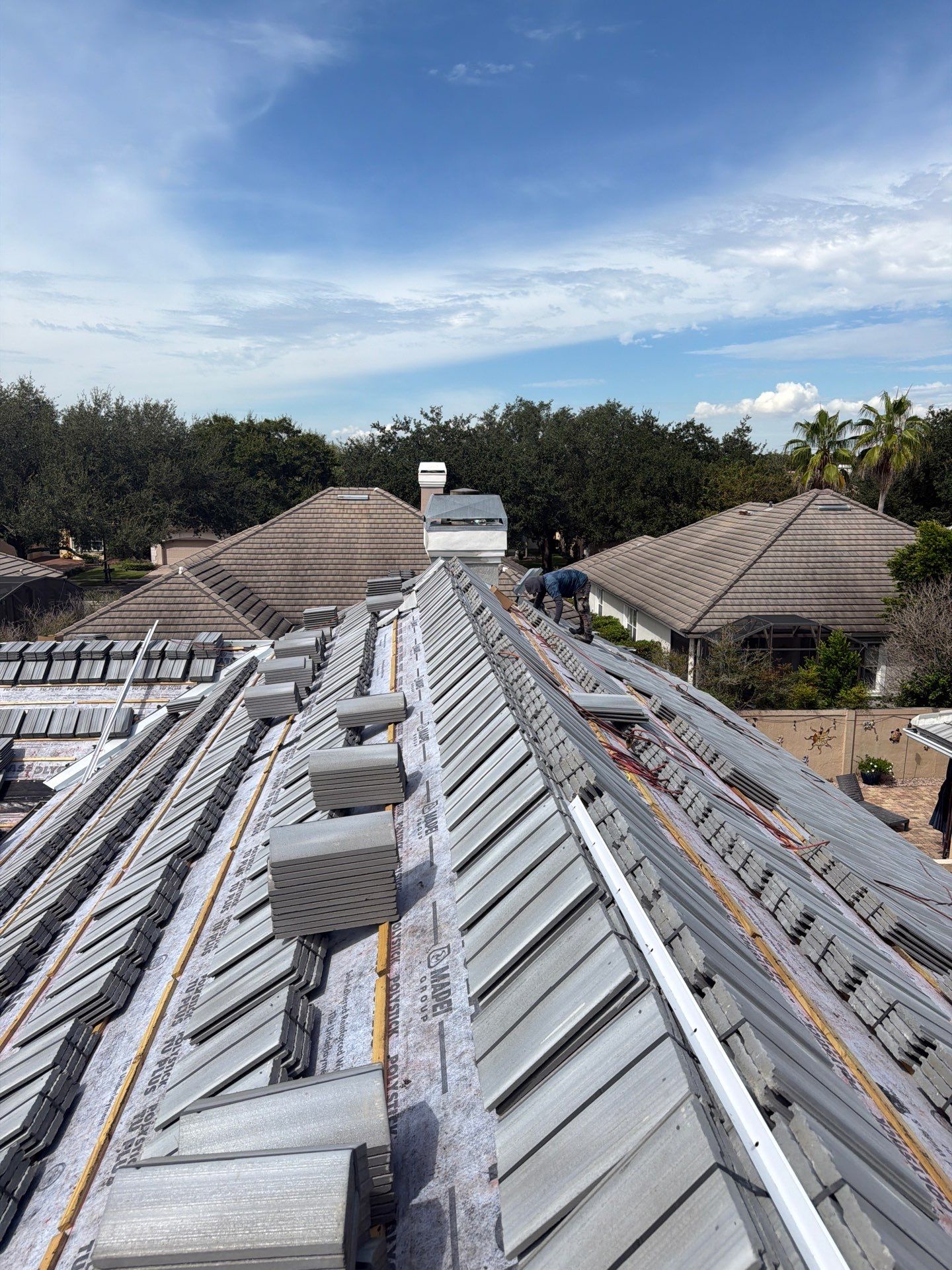 Concrete Tile Roof Repair and Gutter Maintenance in Orlando by Fortified Roofing Solutions Corp.
