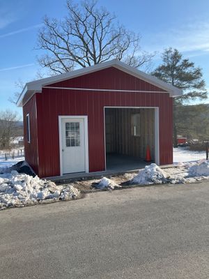 New Red Metal Garage Construction and Residential Window Replacement in Ashland