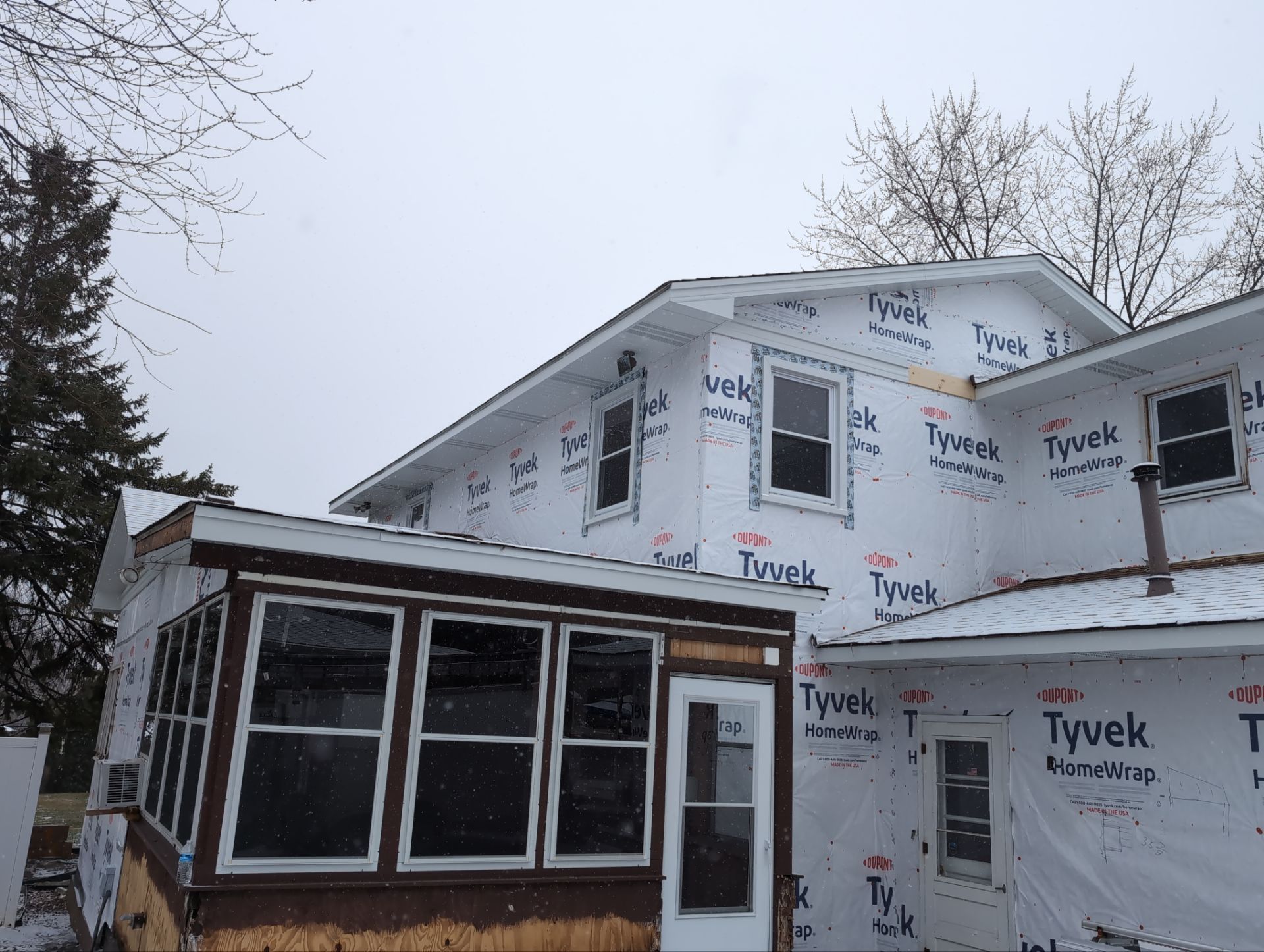 Vinyl siding replacement using CertainTeed Monogram double 5" vinyl siding  by AJ Exteriors & Roofing Inc.