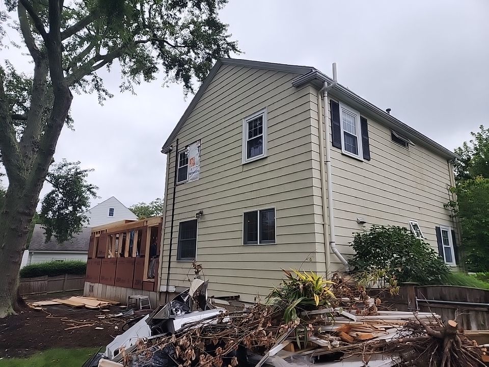 Siding and Roof for house with new addition in Milton, MA by UBrothers Construction