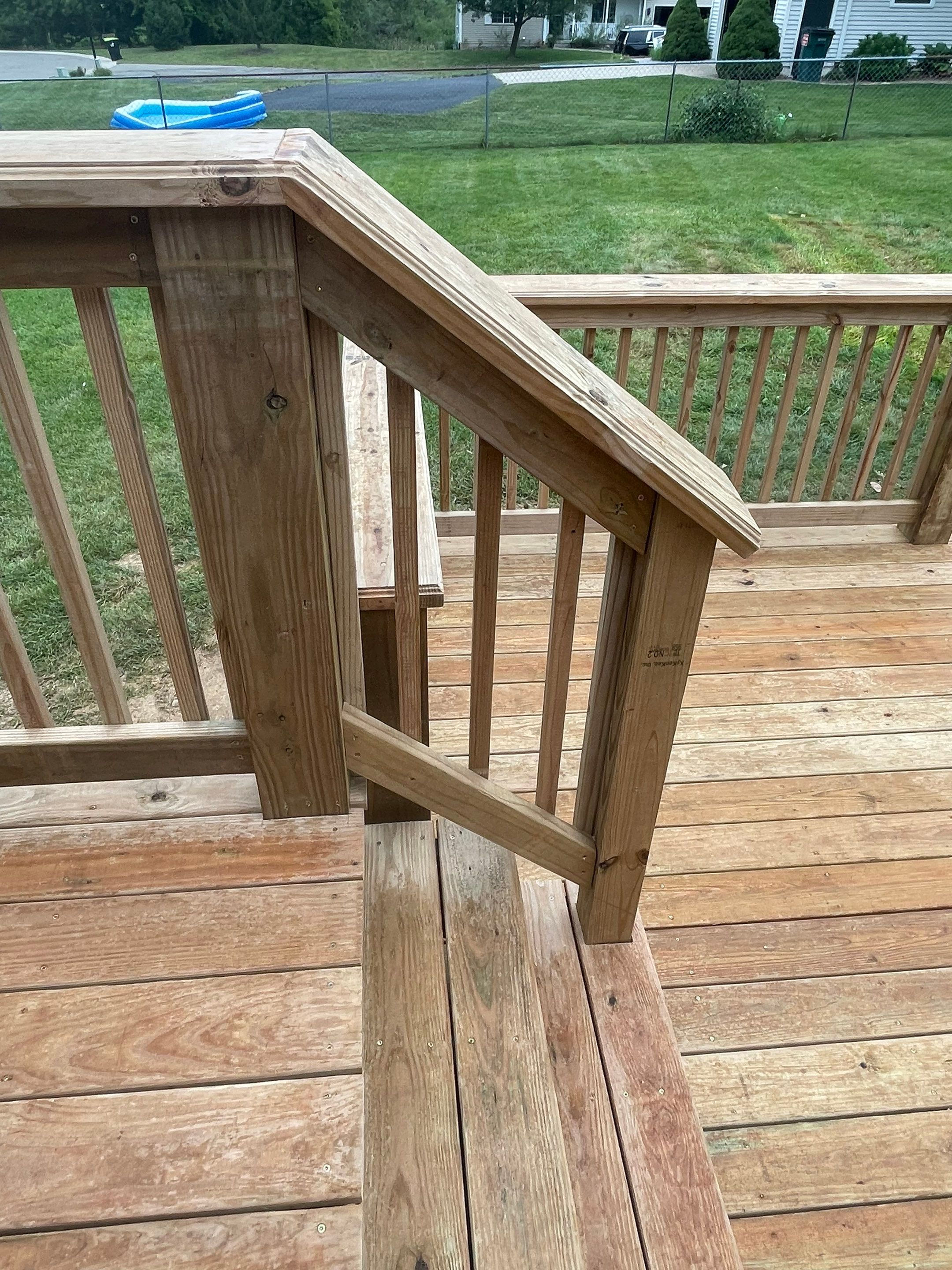Deck Installation using Treated Lumber by Avalon Roofing and Exteriors