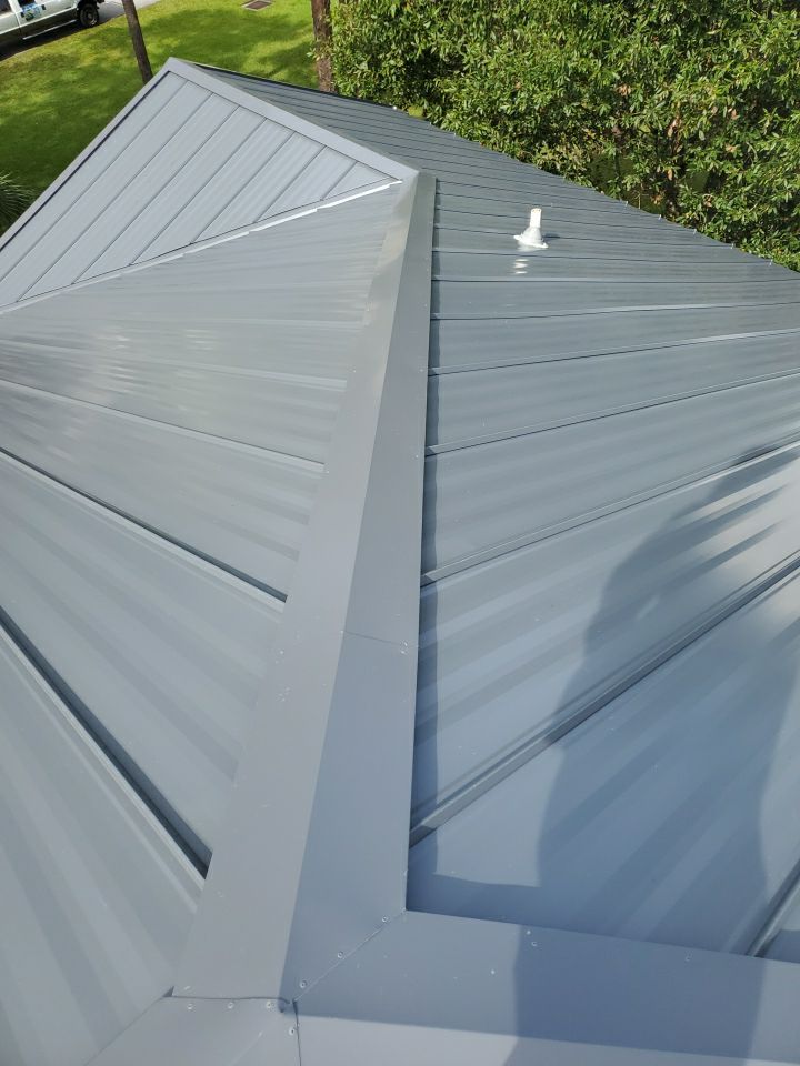Residential Roofing Installation using 1" Nail strip metal roof by BLUES BROTHERS ROOFING